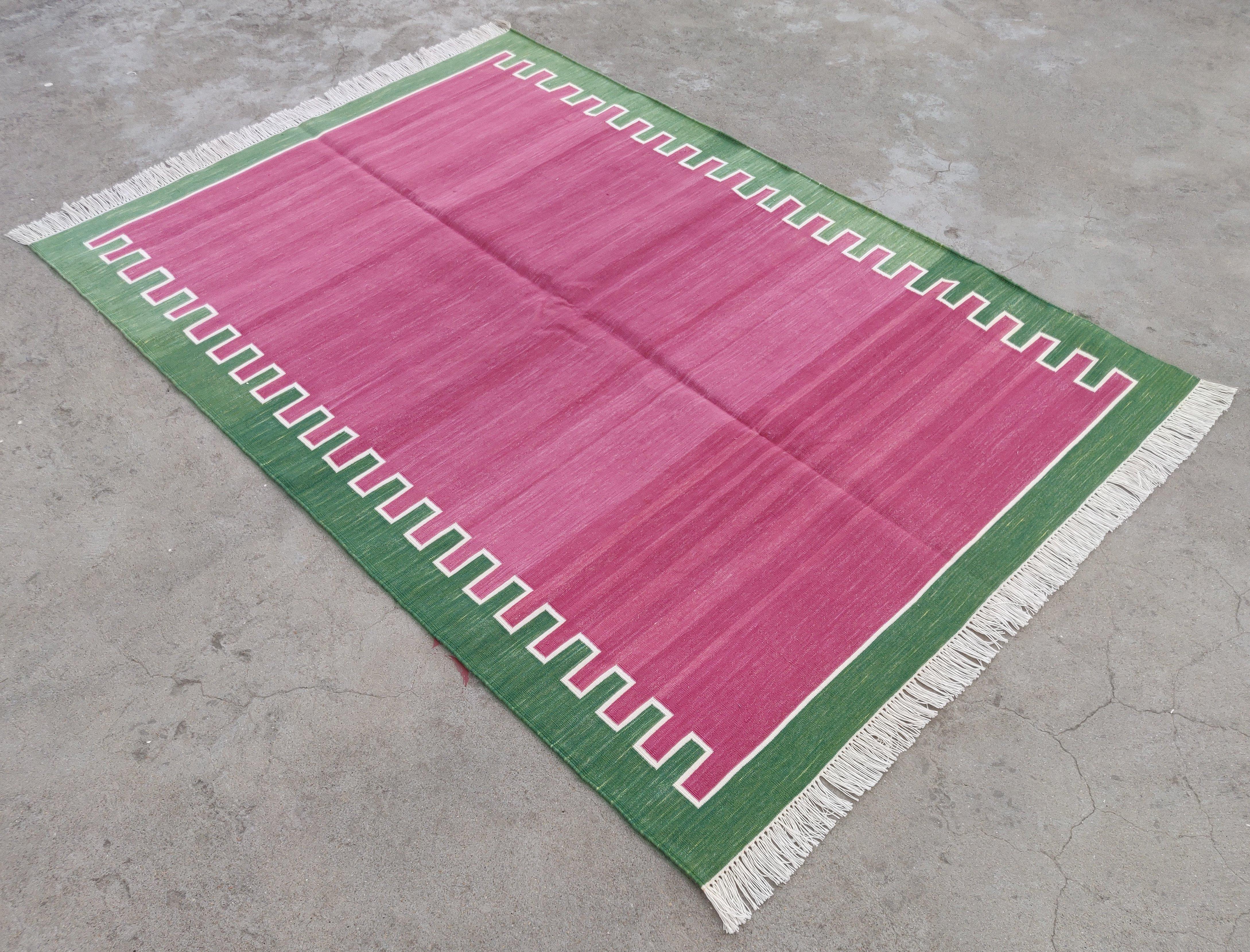 Cotton Vegetable Dyed Raspberry Pink and Green Zig Zag Striped Indian Dhurrie Rug-4'x6' 

These special flat-weave dhurries are hand-woven with 15 ply 100% cotton yarn. Due to the special manufacturing techniques used to create our rugs, the size
