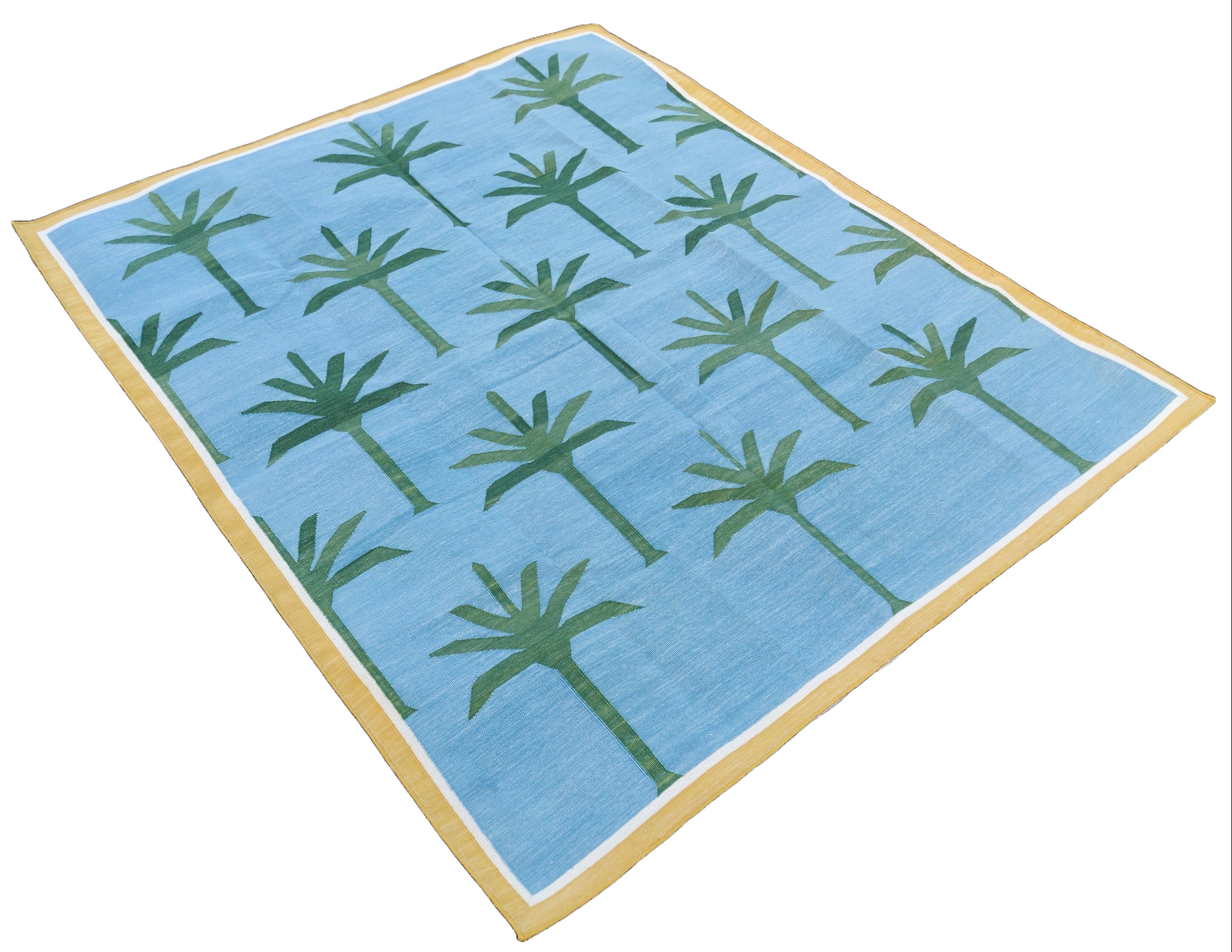 Cotton Vegetable Dyed Sky Blue, Forest Green And Yellow Palm Tree Pattern Indian Dhurrie Rug-5'x7' 
These special flat-weave dhurries are hand-woven with 15 ply 100% cotton yarn. Due to the special manufacturing techniques used to create our rugs,