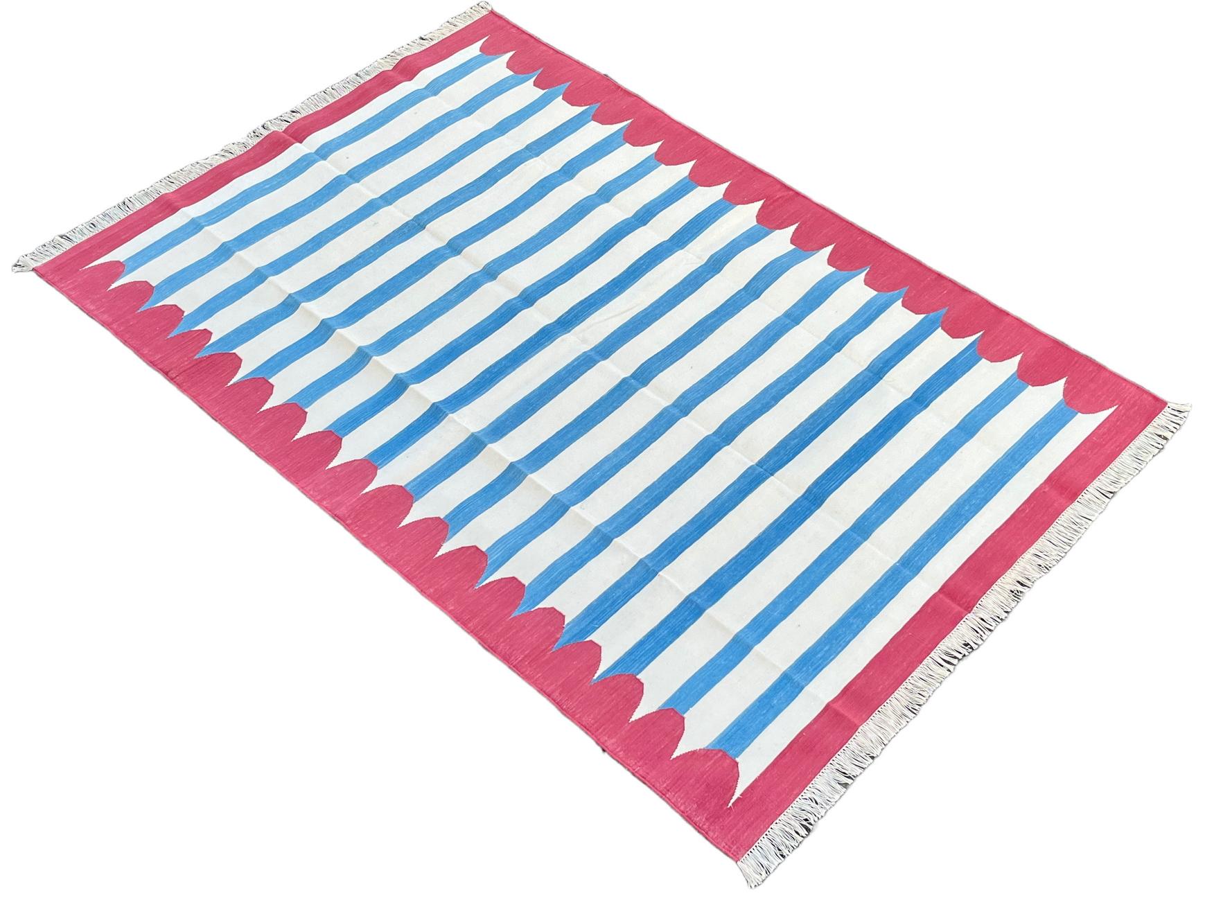 Cotton Vegetable Dyed Blue, White And Raspberry Pink Scalloped Striped Indian Dhurrie Rug-5'x7' 
These special flat-weave dhurries are hand-woven with 15 ply 100% cotton yarn. Due to the special manufacturing techniques used to create our rugs, the
