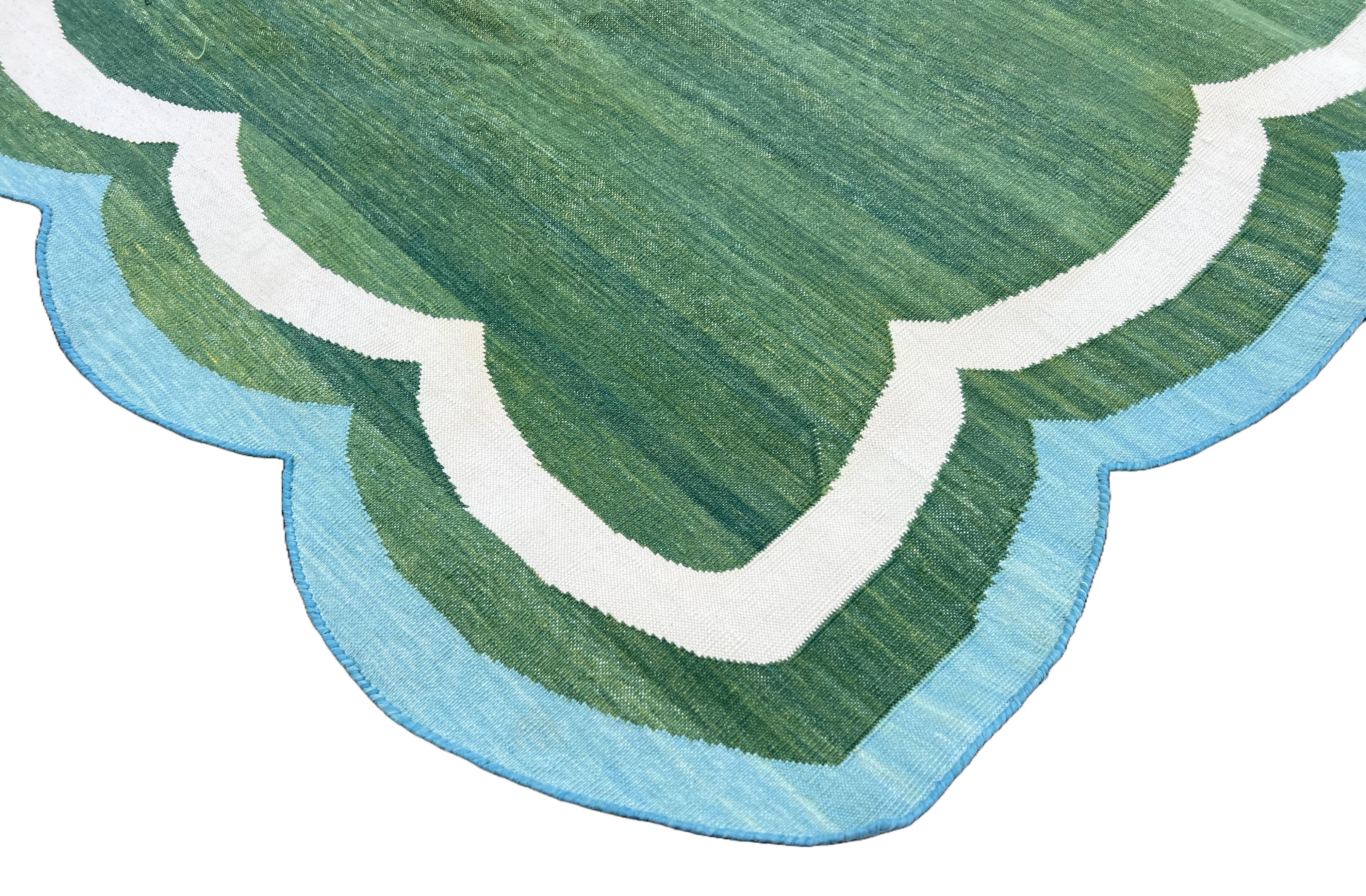 Cotton Vegetable Dyed Forest Green And Teal Blue Scalloped Striped 
Dhurrie Rug-5'x7' (Scallops runs all 4 sides)

These special flat-weave dhurries are hand-woven with 15 ply 100% cotton yarn. Due to the special manufacturing techniques used to