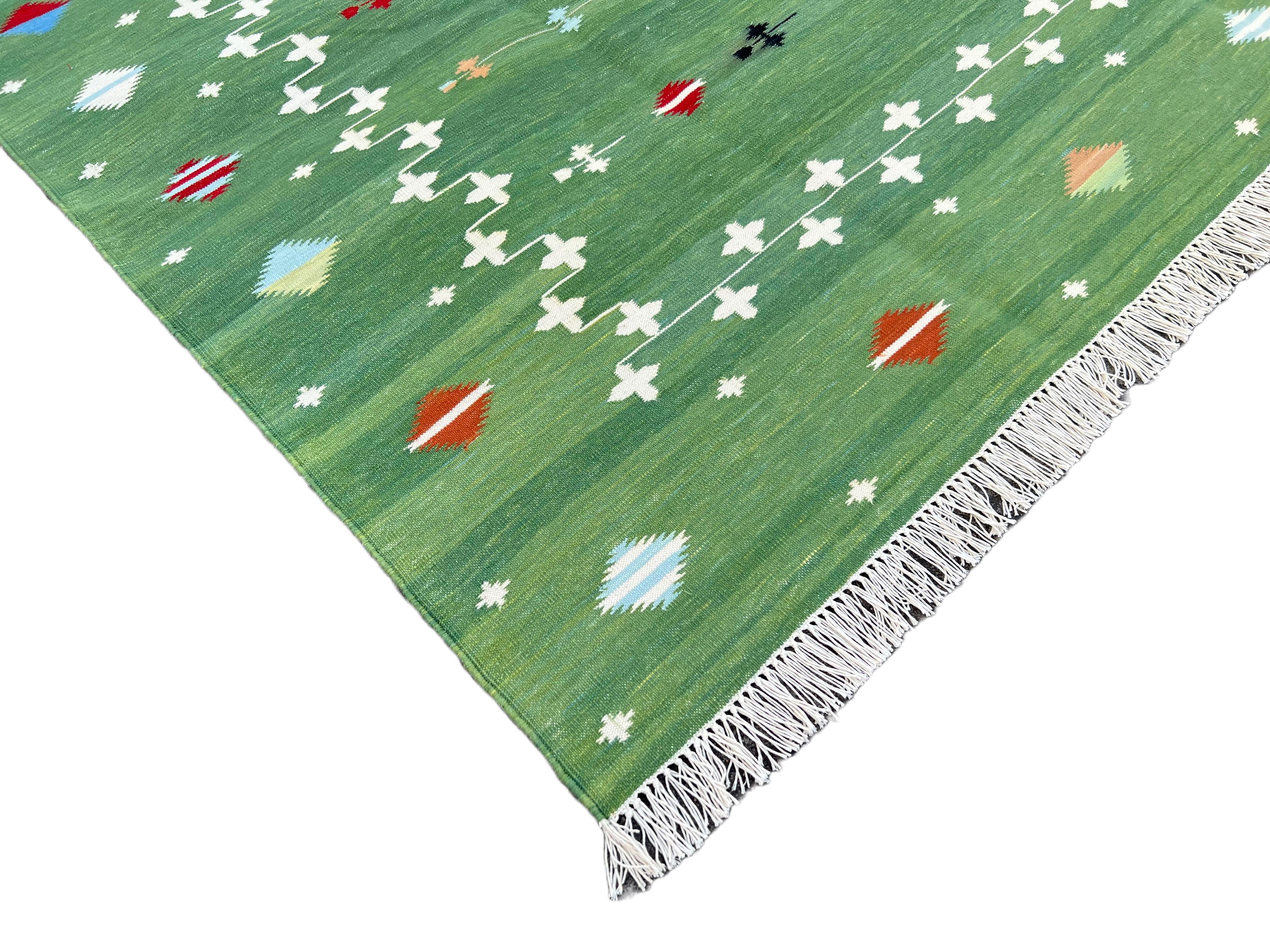 Cotton Vegetable Dyed Reversible Forest Green & White Indian Shooting Star Rug - 5'x7'
These special flat-weave dhurries are hand-woven with 15 ply 100% cotton yarn. Due to the special manufacturing techniques used to create our rugs, the size and
