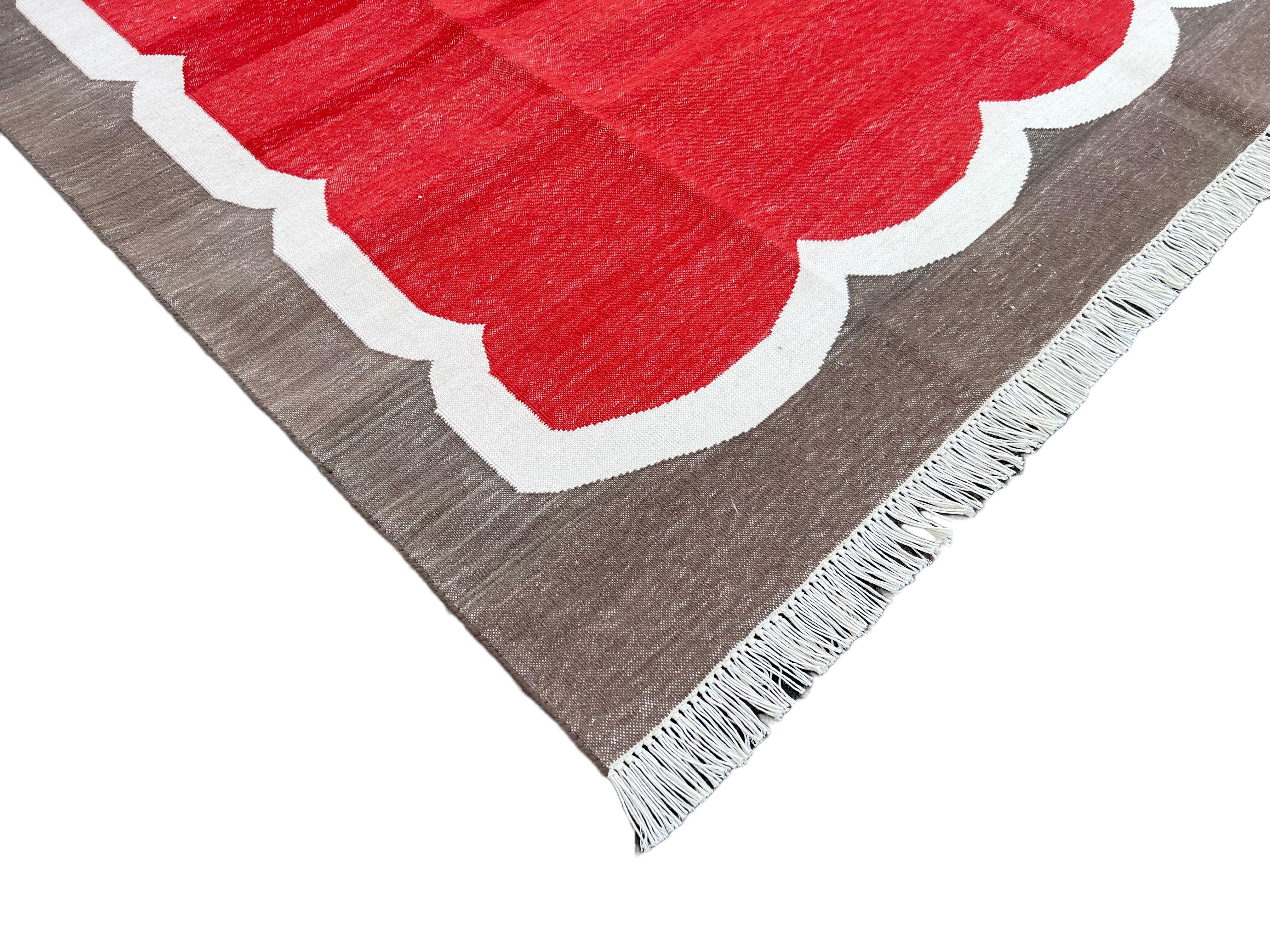 Cotton Vegetable Dyed Red, Cream And Brown Scalloped Striped Indian Dhurrie Rug-5'x7' 
These special flat-weave dhurries are hand-woven with 15 ply 100% cotton yarn. Due to the special manufacturing techniques used to create our rugs, the size and