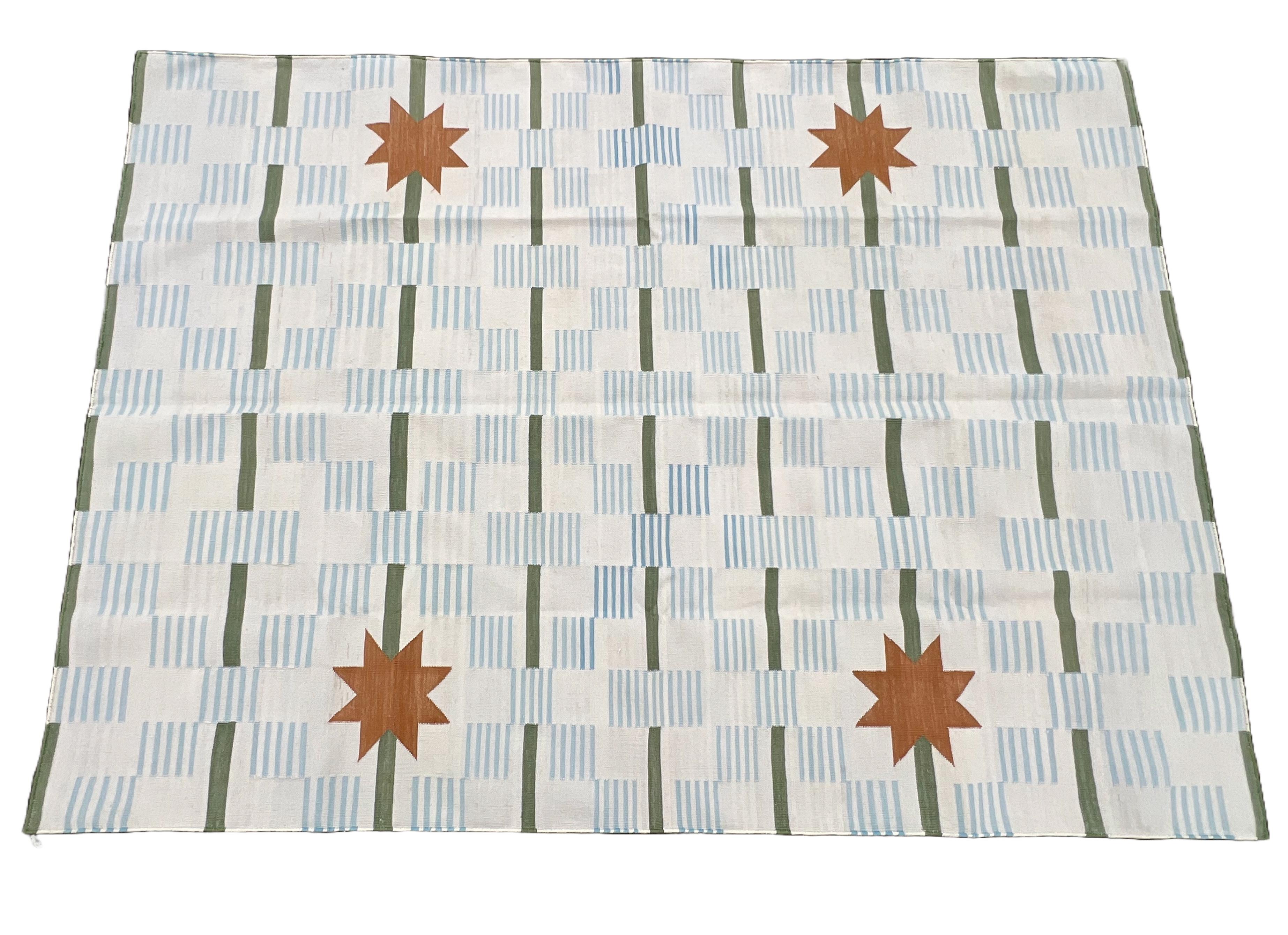 Cotton Natural Vegetable Dyed Natural White, Sky Blue, Green And Tan Striped And Star Dash Rug-5'x7' (150x210cm)

These special flat-weave dhurries are hand-woven with 15 ply 100% cotton yarn. Due to the special manufacturing techniques used to
