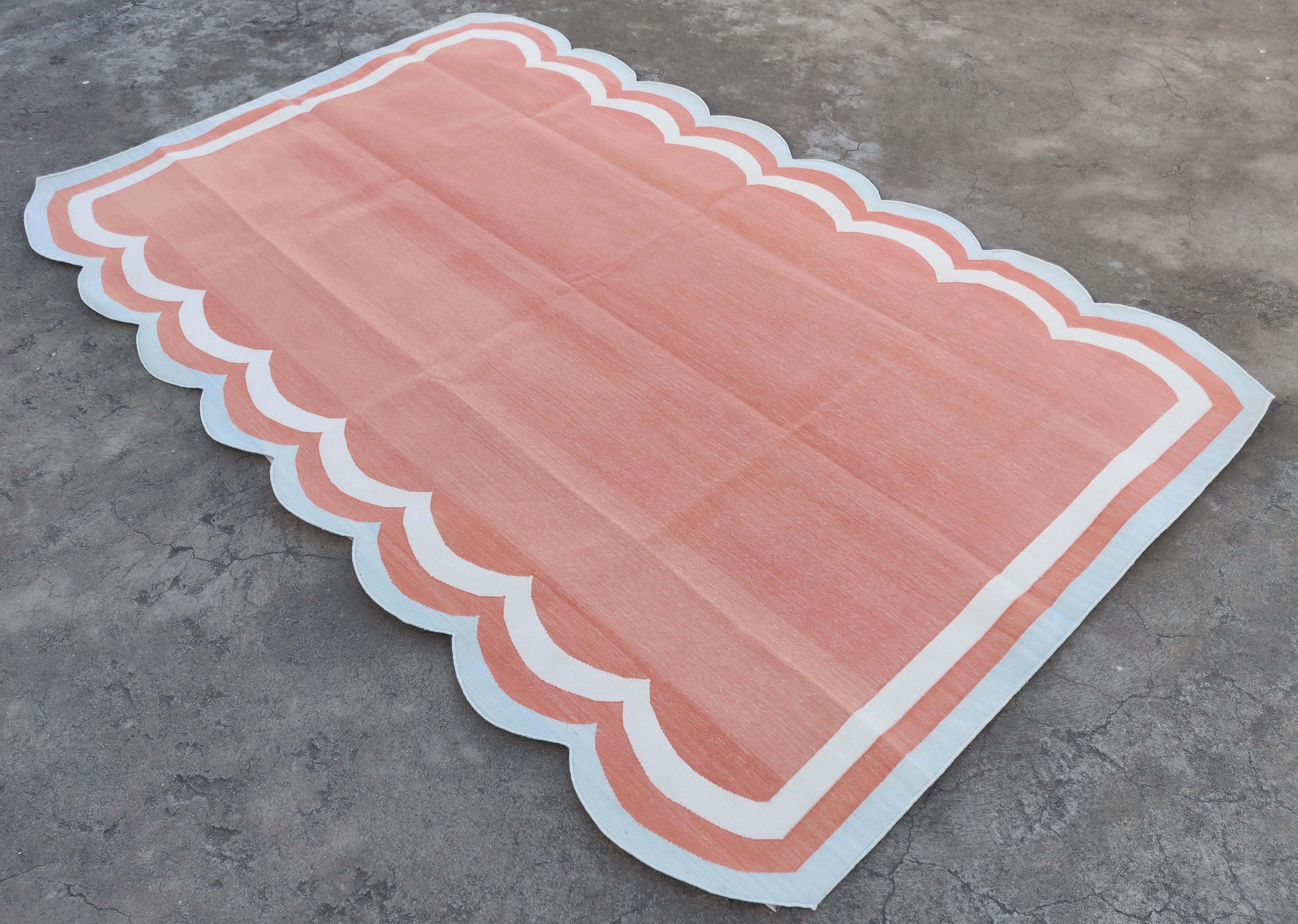 Cotton Vegetable Dyed Terracotta Red and Sky Blue Scalloped Striped Indian Dhurrie Rug-5'x8' 

These special flat-weave dhurries are hand-woven with 15 ply 100% cotton yarn. Due to the special manufacturing techniques used to create our rugs, the