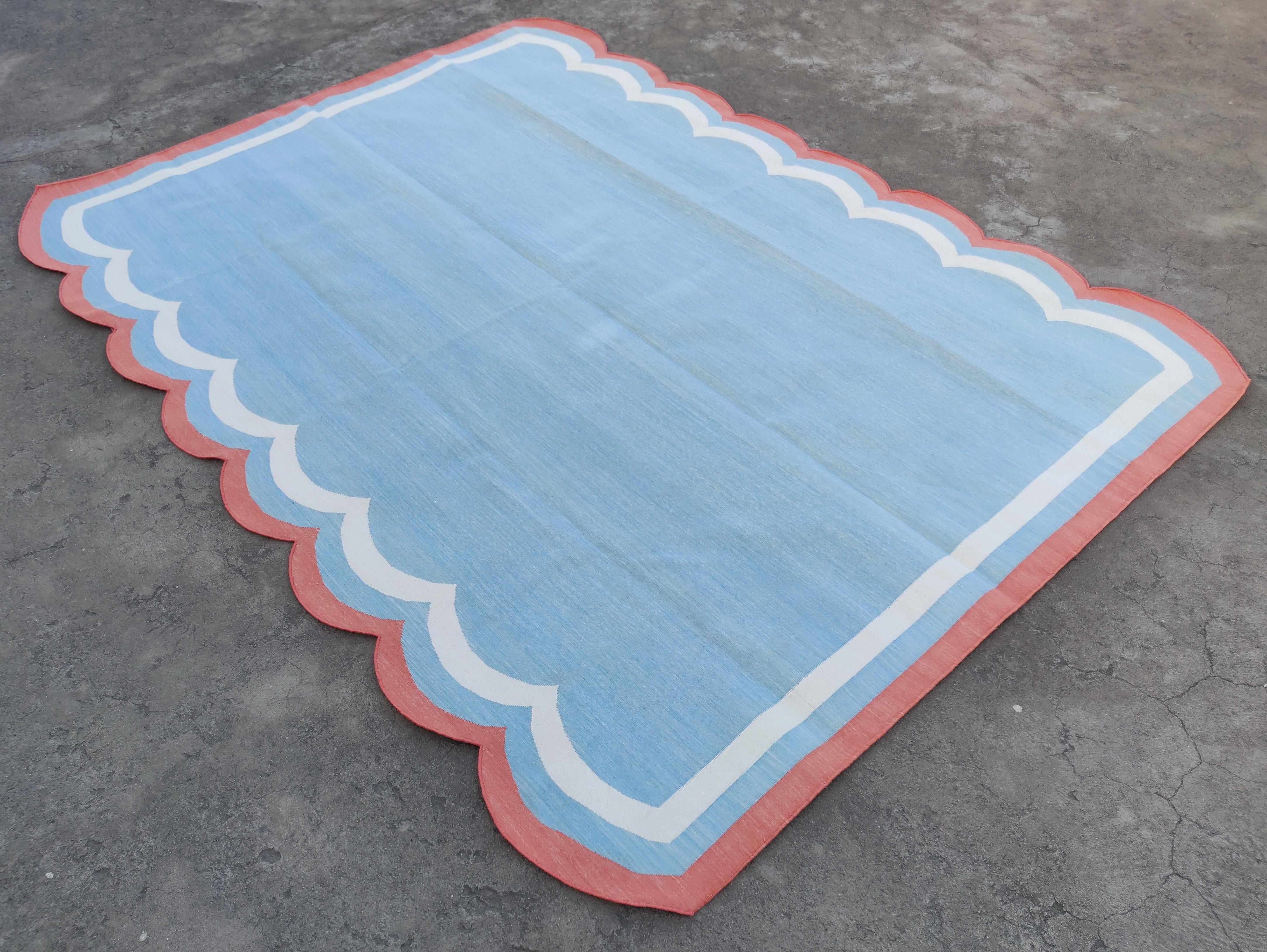 Cotton Vegetable Dyed Sky Blue and Coral Four Sided Scalloped Striped Indian Dhurrie Rug-6'x8' 

These special flat-weave dhurries are hand-woven with 15 ply 100% cotton yarn. Due to the special manufacturing techniques used to create our rugs, the