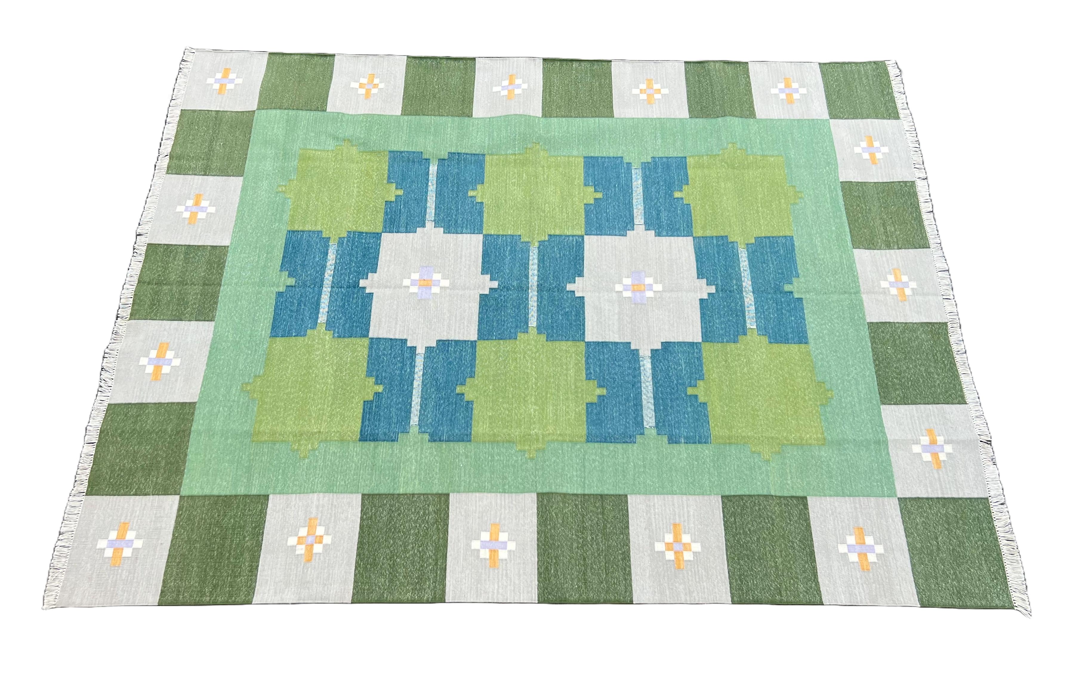 Cotton Natural Vegetable Dyed Green, Blue And Grey Geometric Indian Dhurrie Rug-6'x8'

These special flat-weave dhurries are hand-woven with 15 ply 100% cotton yarn. Due to the special manufacturing techniques used to create our rugs, the size and
