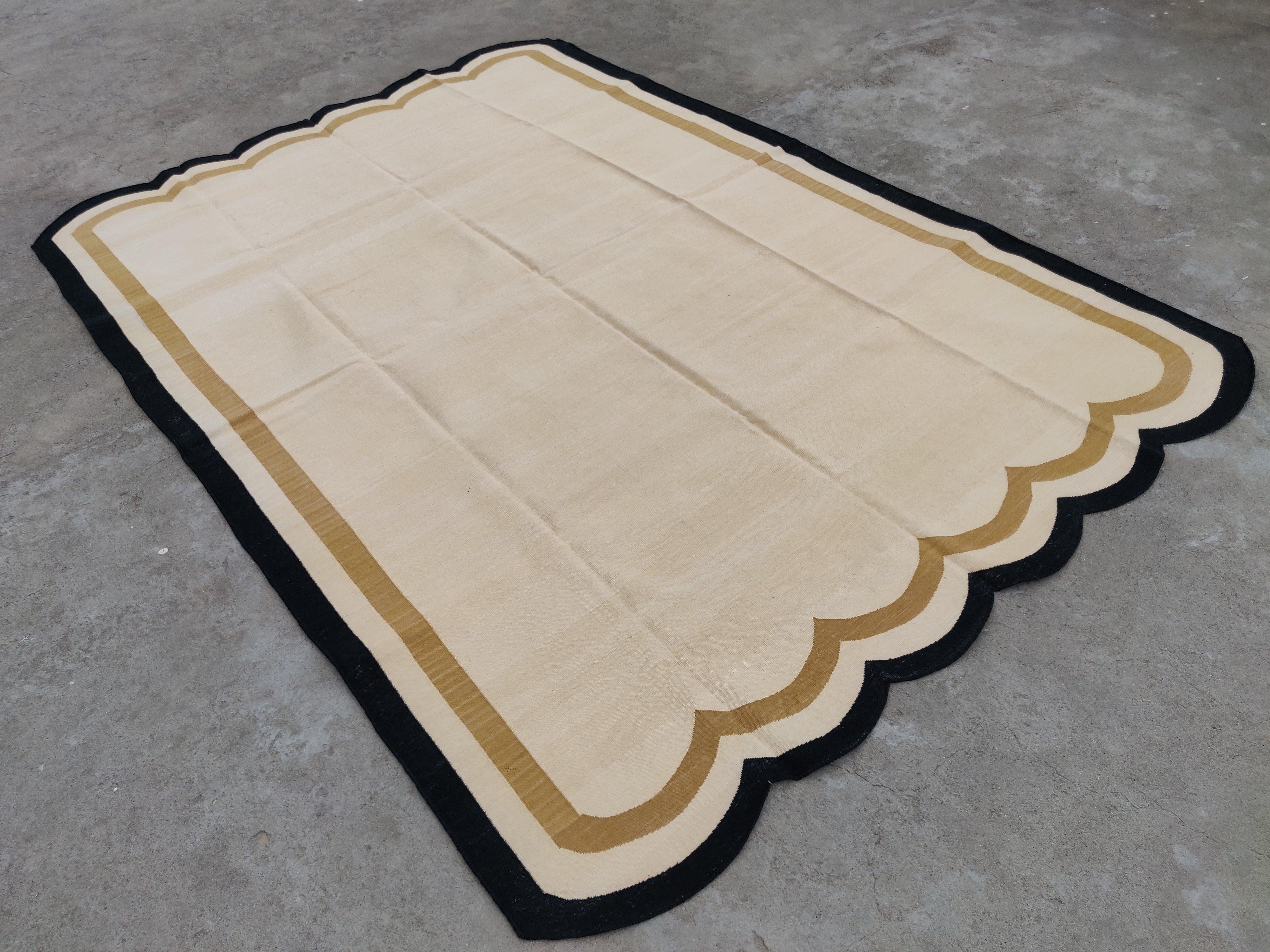 Cotton Vegetable Dyed Reversible Beige And Black Indian Scalloped Rug - 6'x9'
These special flat-weave dhurries are hand-woven with 15 ply 100% cotton yarn. Due to the special manufacturing techniques used to create our rugs, the size and color of