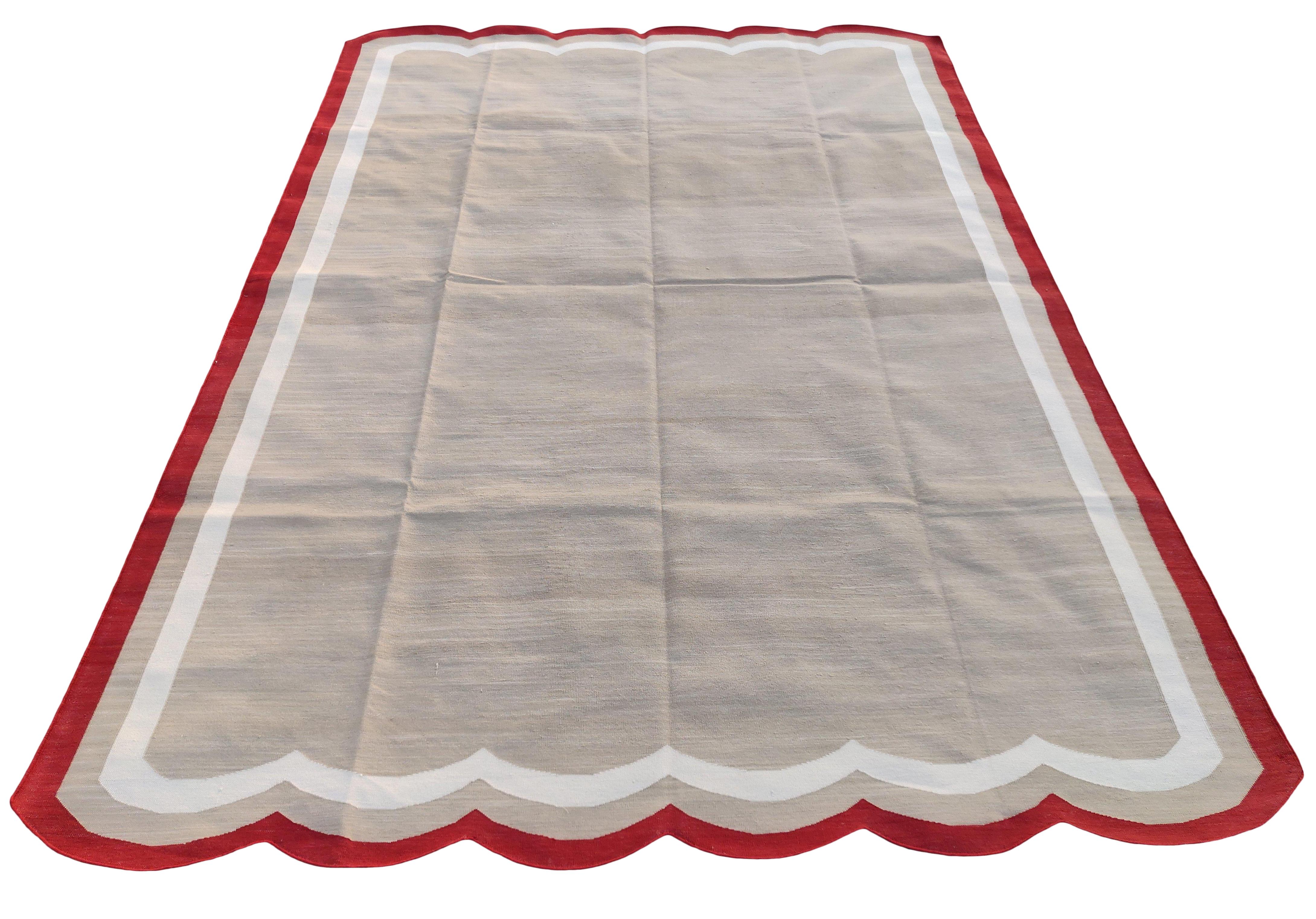 Cotton Vegetable Dyed Cream, Beige And Red Two Sided Scalloped Rug-6'x9' 
(Scallops runs on 6 Feet Sides)
These special flat-weave dhurries are hand-woven with 15 ply 100% cotton yarn. Due to the special manufacturing techniques used to create our