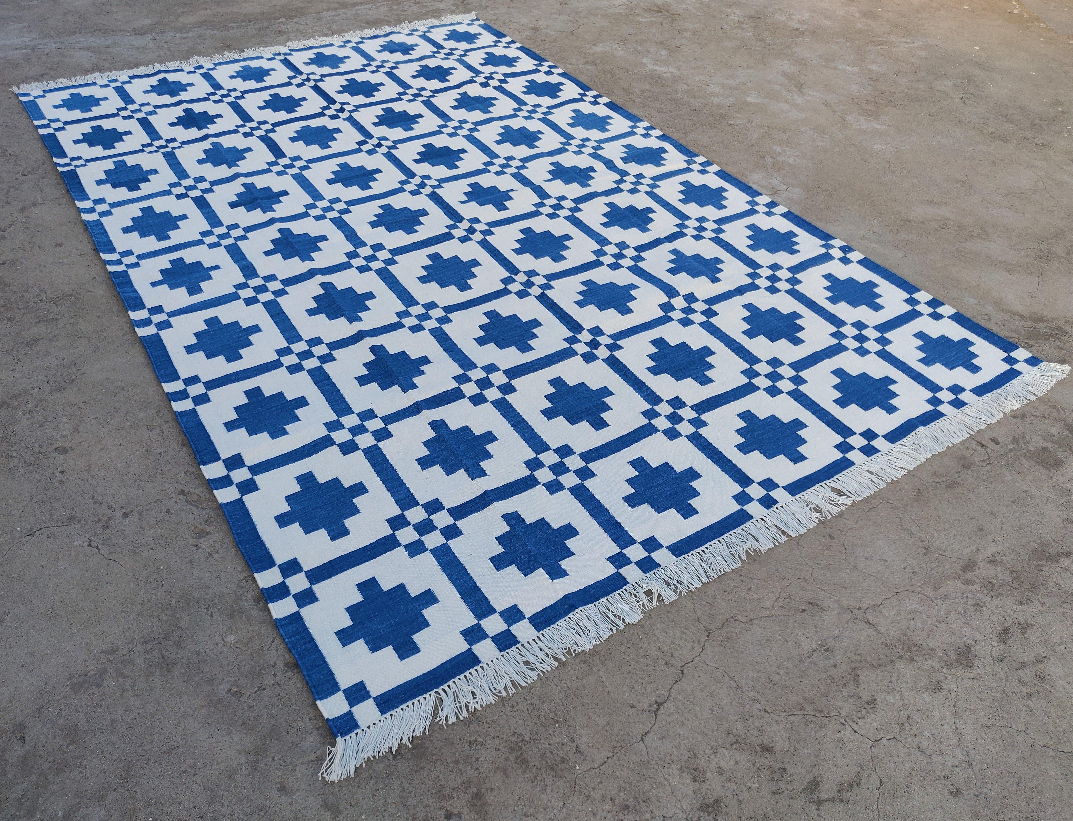 Cotton Vegetable Dyed Indigo Blue and White Geometric Indian Dhurrie Rug-6'x9' 

These special flat-weave dhurries are hand-woven with 15 ply 100% cotton yarn. Due to the special manufacturing techniques used to create our rugs, the size and color