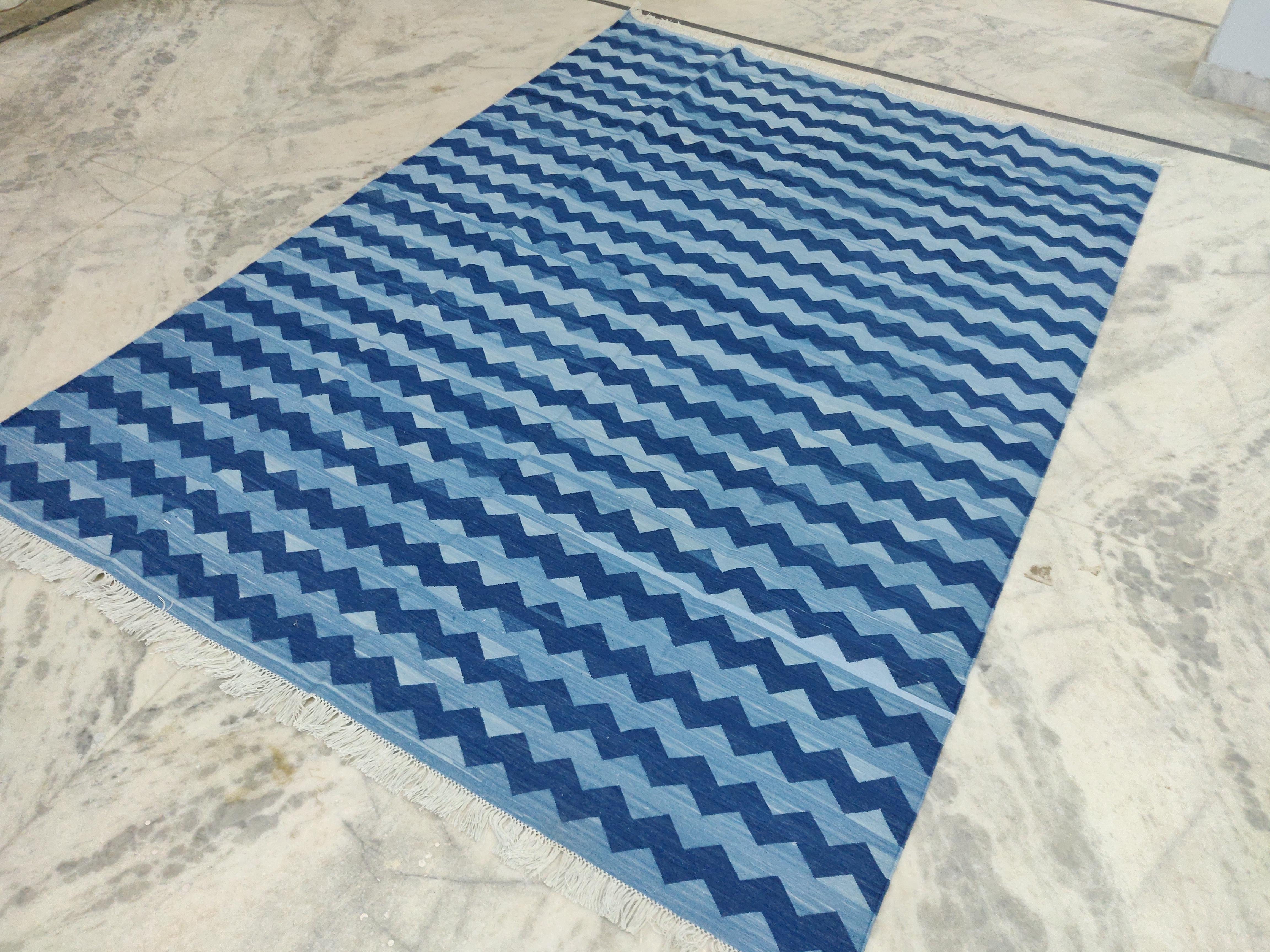 Cotton Vegetable Dyed Indigo Blue and Sky Blue Zig Zag Striped Indian Dhurrie Rug-6'x9'(180x270cm) 

These special flat-weave dhurries are hand-woven with 15 ply 100% cotton yarn. Due to the special manufacturing techniques used to create our rugs,