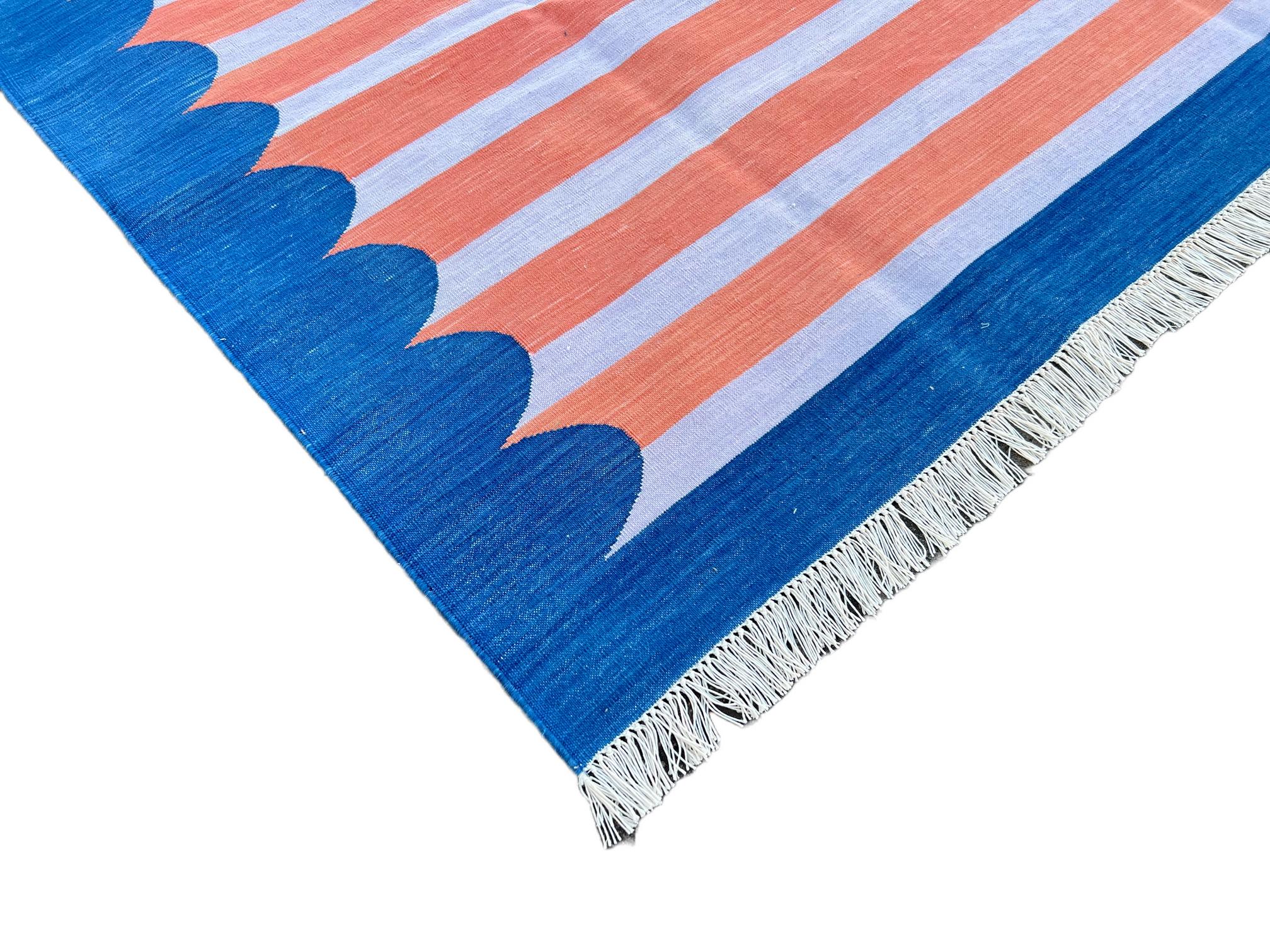Cotton Vegetable Dyed Coral, Lavender And Indigo Blue Scalloped Striped Indian Dhurrie Rug-6'x9' 
These special flat-weave dhurries are hand-woven with 15 ply 100% cotton yarn. Due to the special manufacturing techniques used to create our rugs, the