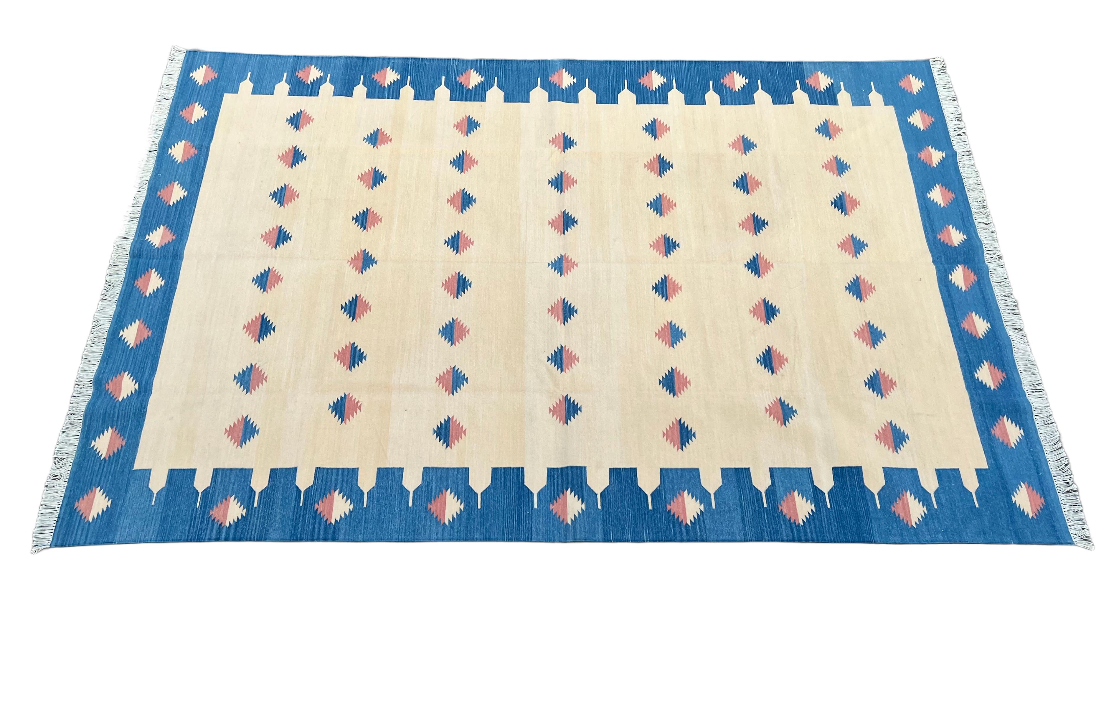 Cotton Vegetable Dyed Cream, Coral And Blue Diamond Indian Dhurrie Rug-6'x9'

These special flat-weave dhurries are hand-woven with 15 ply 100% cotton yarn. Due to the special manufacturing techniques used to create our rugs, the size and color of