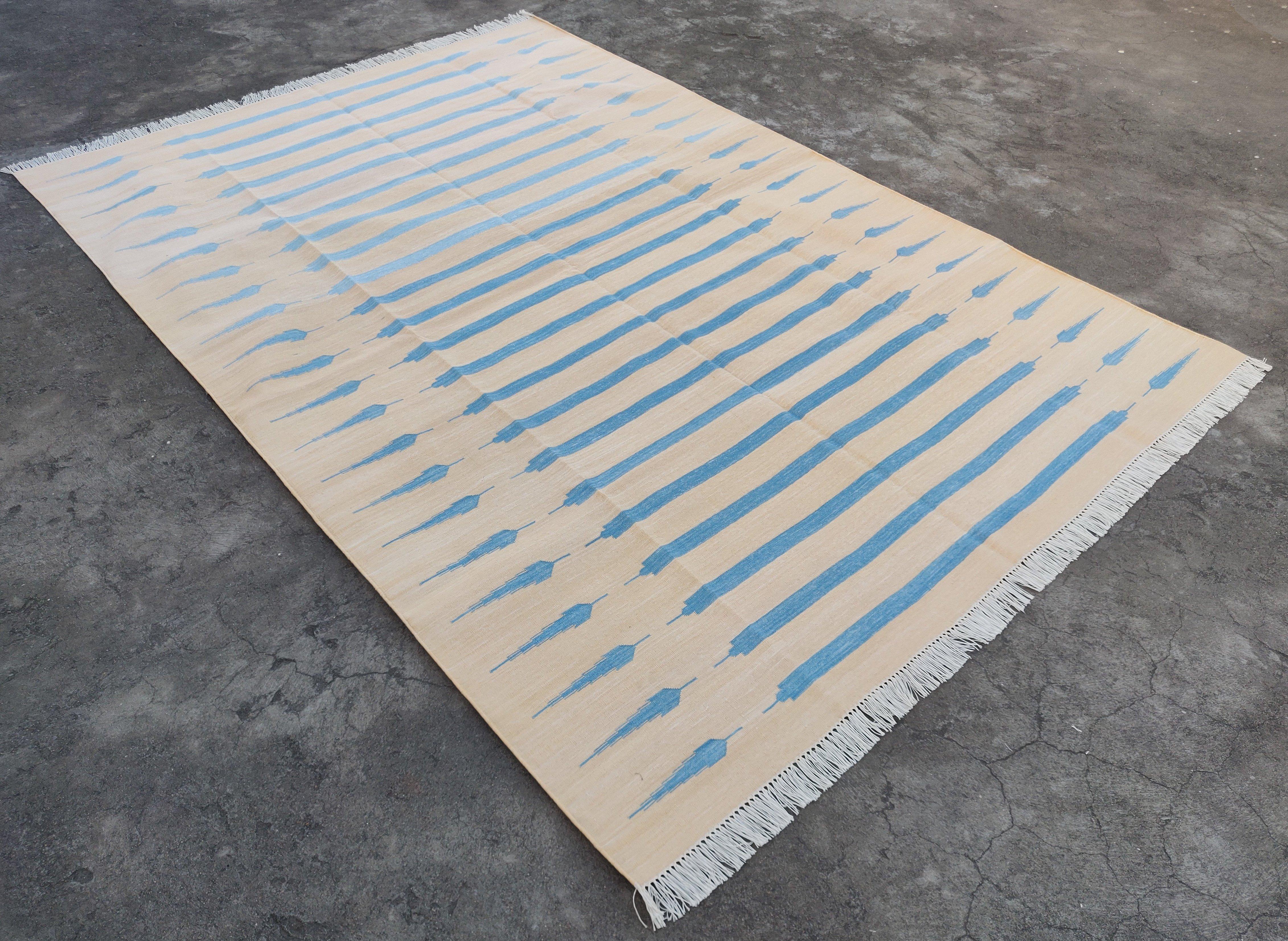 Cotton Vegetable Dyed Cream And Blue Striped Indian Dhurrie Rug - 6'x9' (180x270cm) 

These special flat-weave dhurries are hand-woven with 15 ply 100% cotton yarn. Due to the special manufacturing techniques used to create our rugs, the size and
