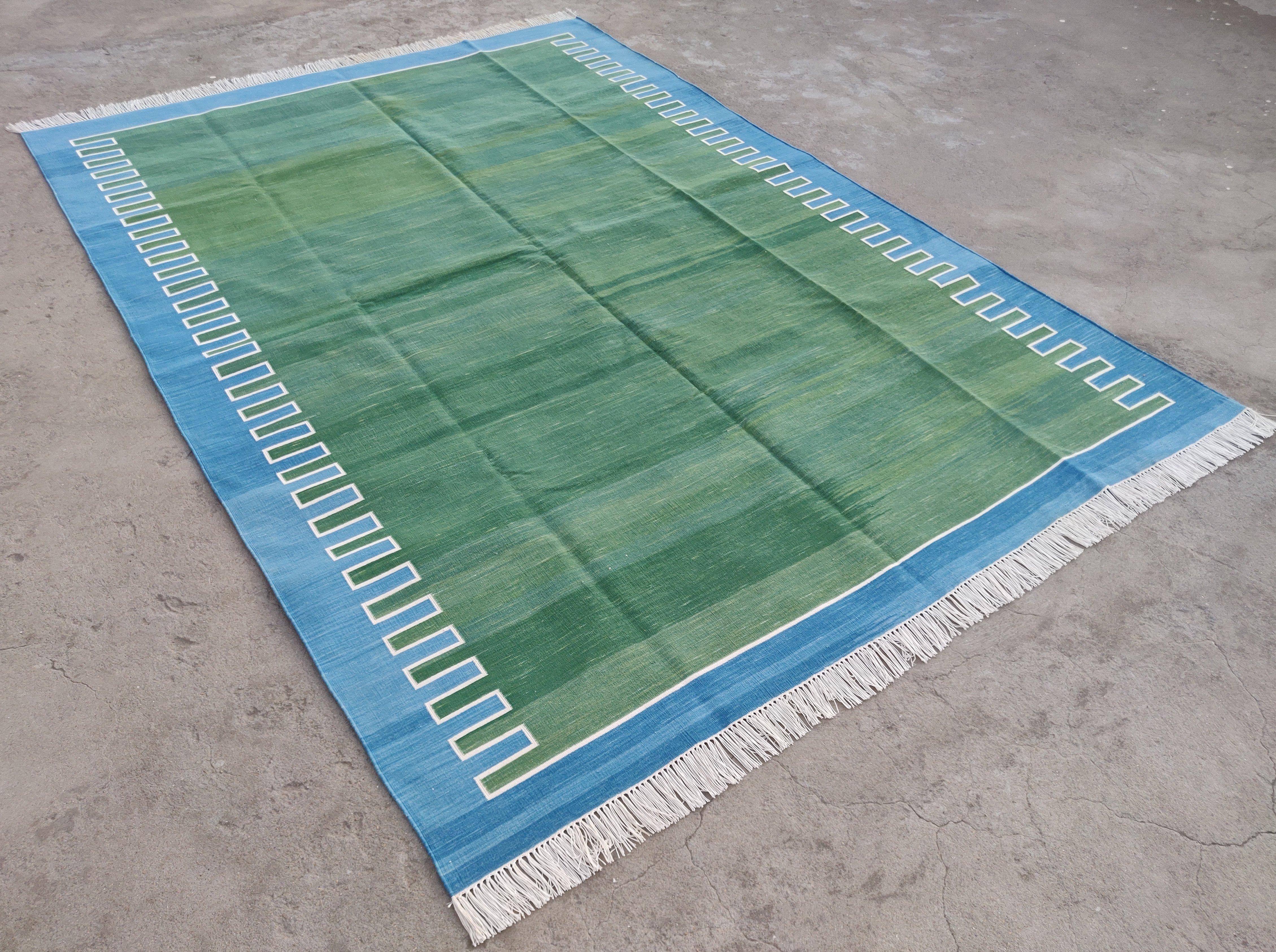Cotton Vegetable Dyed Forest Green, Cream And Blue Zig Zag Striped Indian Dhurrie Rug-6'x9' 
These special flat-weave dhurries are hand-woven with 15 ply 100% cotton yarn. Due to the special manufacturing techniques used to create our rugs, the size