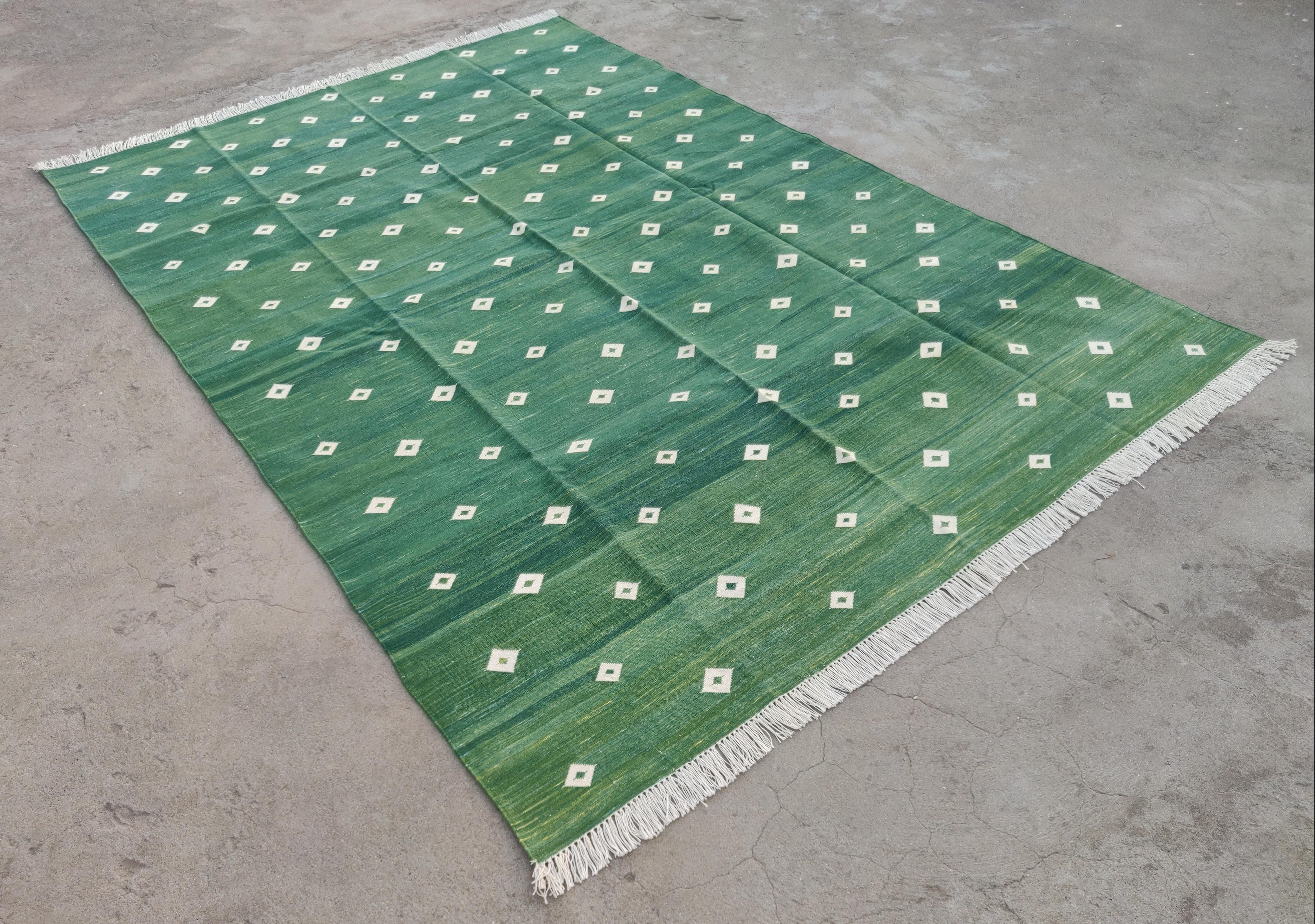 Handmade Cotton Natural Vegetable Dyed Rug, Forest Green And White Diamond Indian Dhurrie- 6'x9'
These special flat-weave dhurries are hand-woven with 15 ply 100% cotton yarn. Due to the special manufacturing techniques used to create our rugs, the