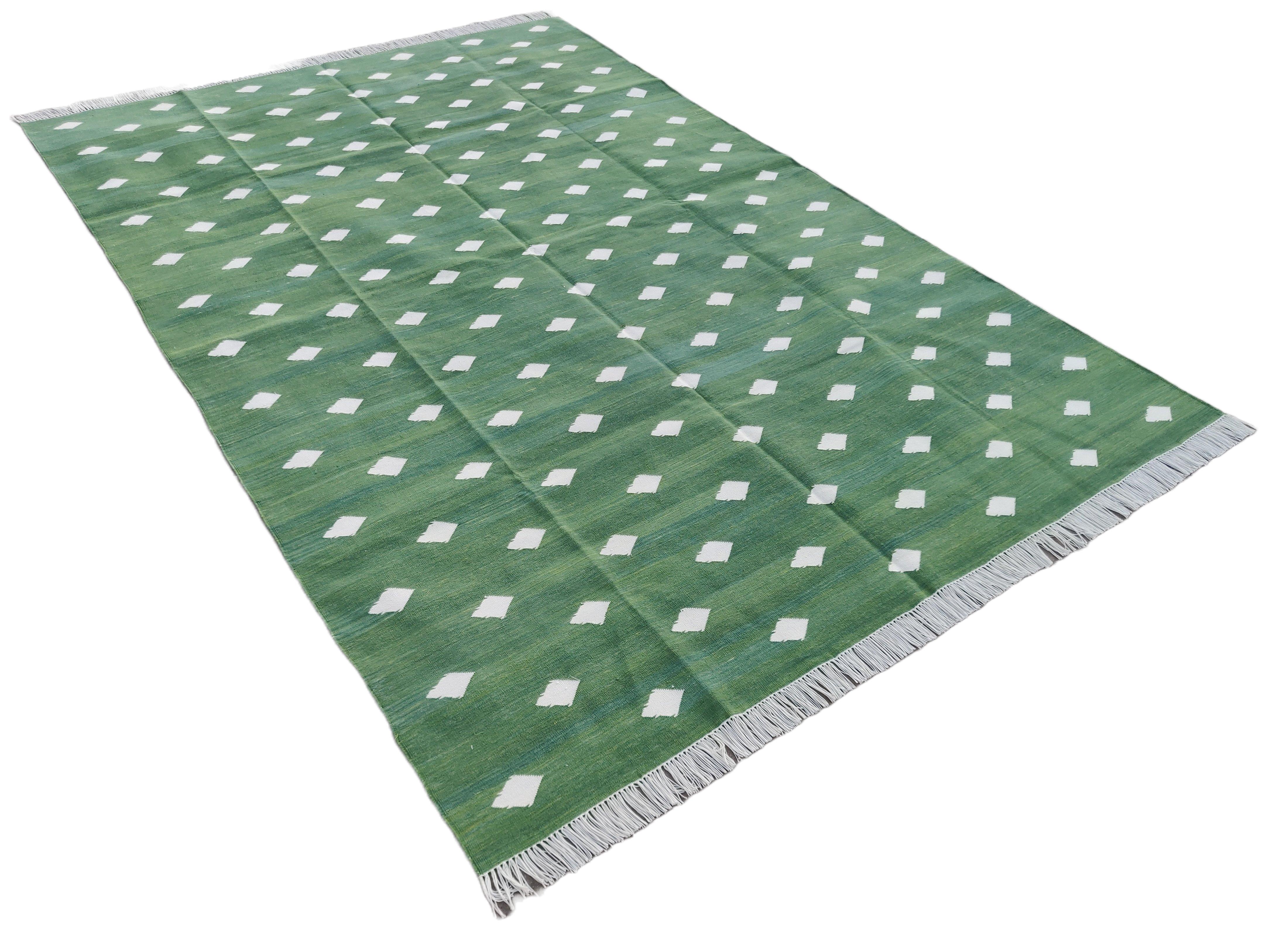 Handmade Cotton Natural Vegetable Dyed Rug, Forest Green And White Leaf Patterned Indian Dhurrie- 6'x9'
These special flat-weave dhurries are hand-woven with 15 ply 100% cotton yarn. Due to the special manufacturing techniques used to create our