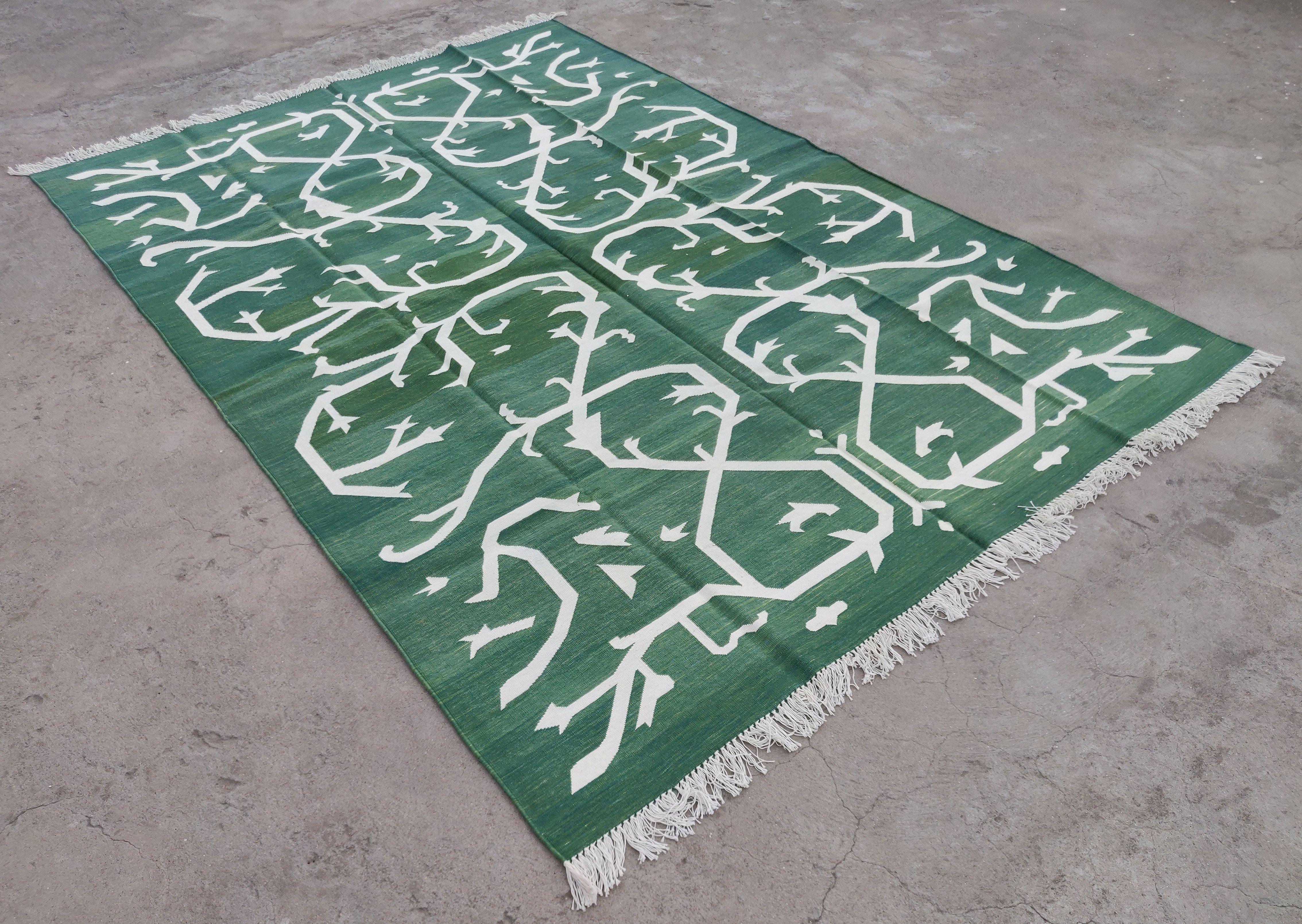 Cotton Vegetable Dyed Forest Green And White Tree Pattern Indian Dhurrie Rug-6'x9' 
These special flat-weave dhurries are hand-woven with 15 ply 100% cotton yarn. Due to the special manufacturing techniques used to create our rugs, the size and