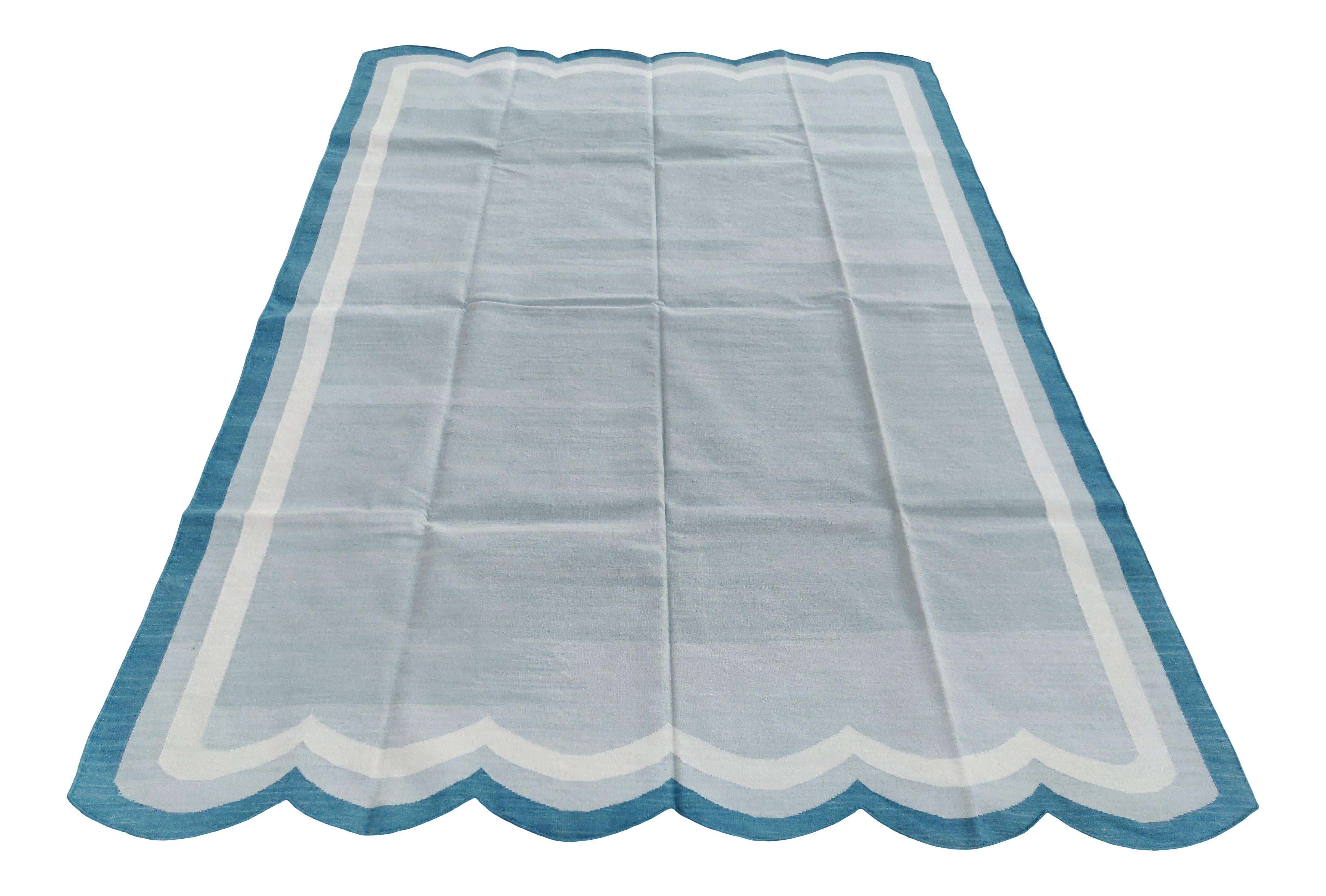 Cotton Vegetable Dyed Grey, Cream And Teal Blue Two Sided Scalloped Rug-6'x9' 
(Scallops runs on 6 Feet Sides)
These special flat-weave dhurries are hand-woven with 15 ply 100% cotton yarn. Due to the special manufacturing techniques used to create