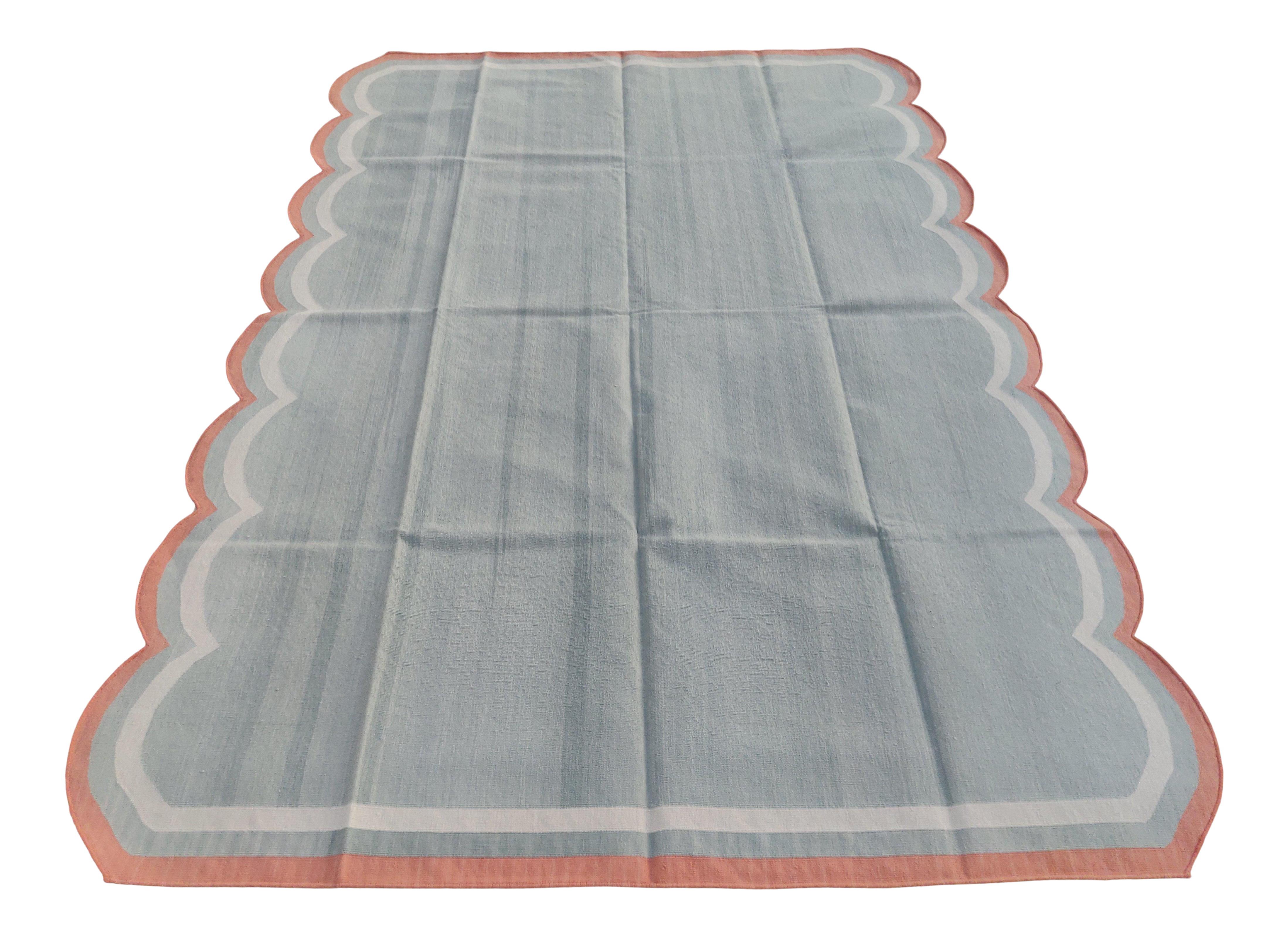 Cotton Vegetable Dyed Pale Aqua And Coral Scalloped Striped Indian Dhurrie Rug-6'x9' 
These special flat-weave dhurries are hand-woven with 15 ply 100% cotton yarn. Due to the special manufacturing techniques used to create our rugs, the size and