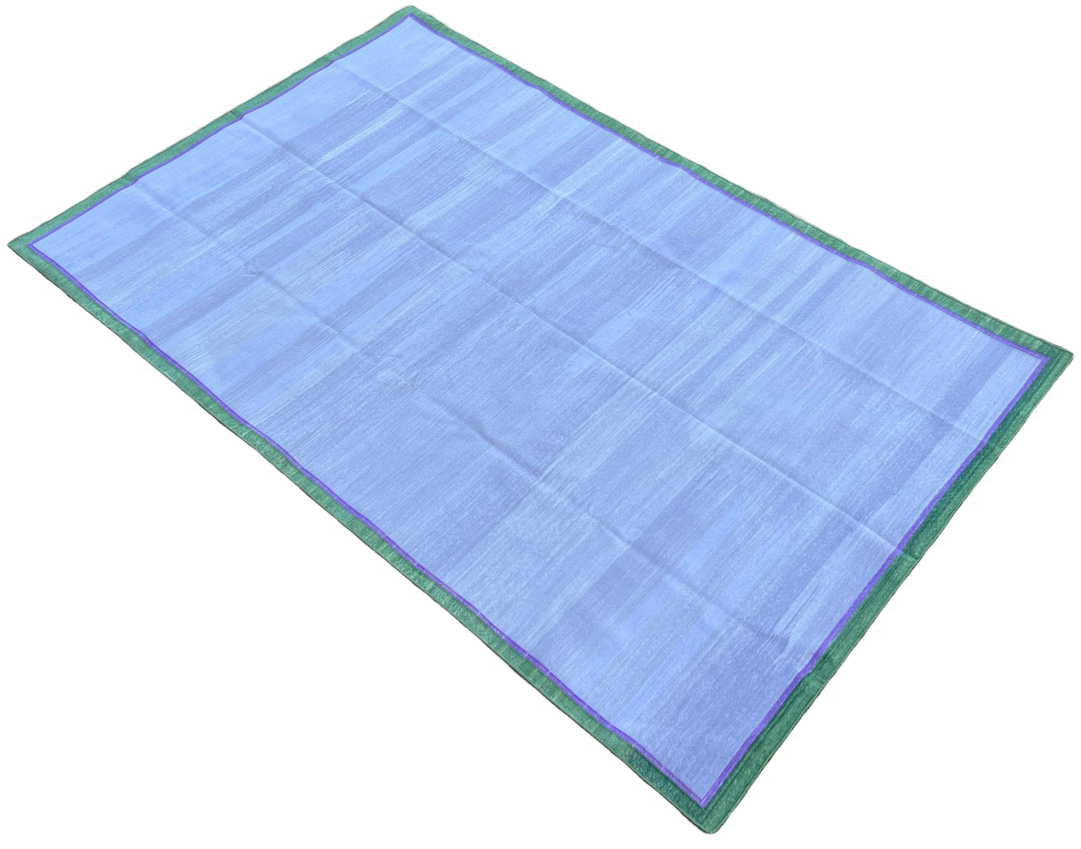 Cotton Vegetable Dyed Lavender, Purple And Green Empty Field Border Indian Dhurrie Rug-6'x9'

These special flat-weave dhurries are hand-woven with 15 ply 100% cotton yarn. Due to the special manufacturing techniques used to create our rugs, the