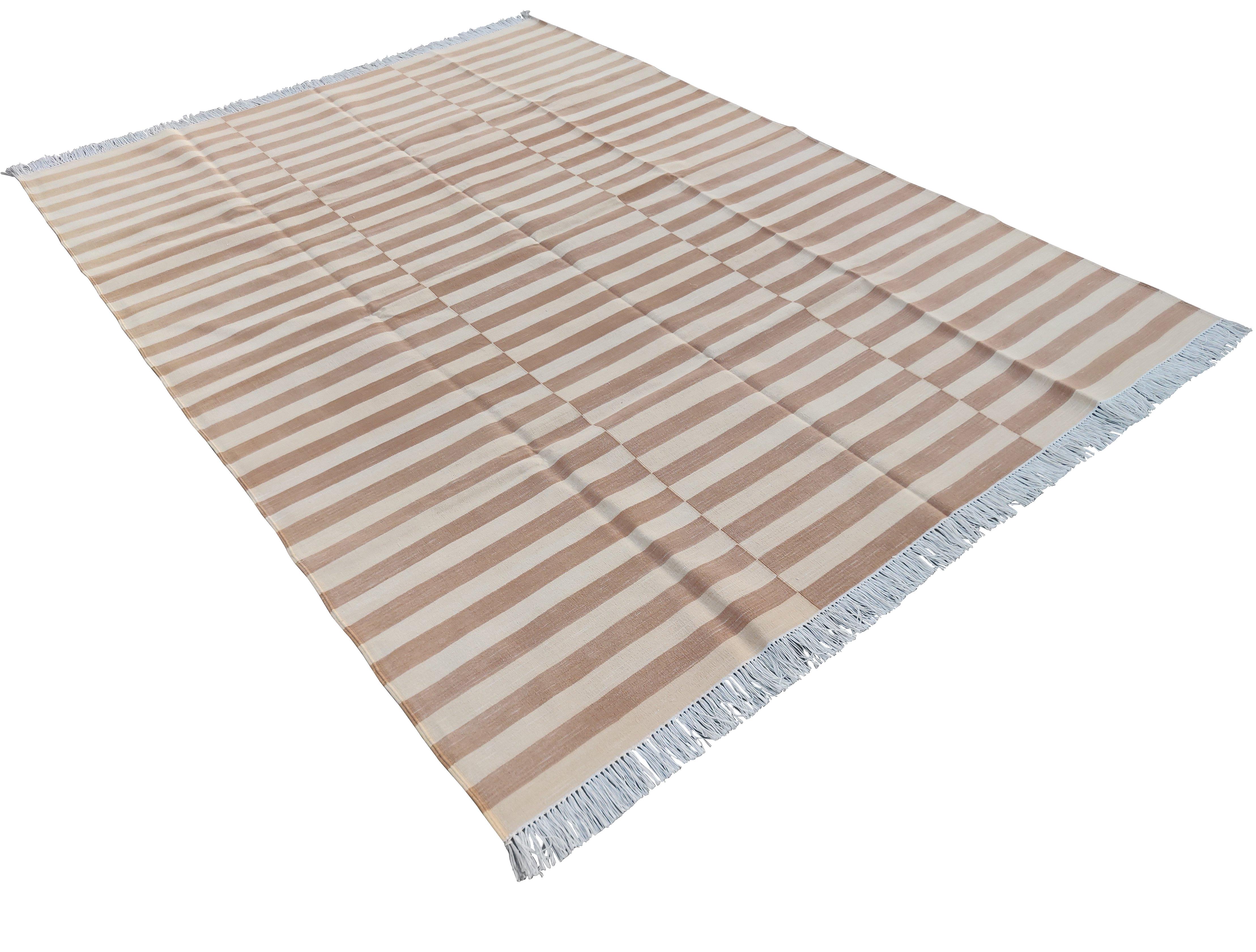 Cotton Vegetable Dyed Tan and Cream Striped Indian Dhurrie Rug-6'x9' 

These special flat-weave dhurries are hand-woven with 15 ply 100% cotton yarn. Due to the special manufacturing techniques used to create our rugs, the size and color of each