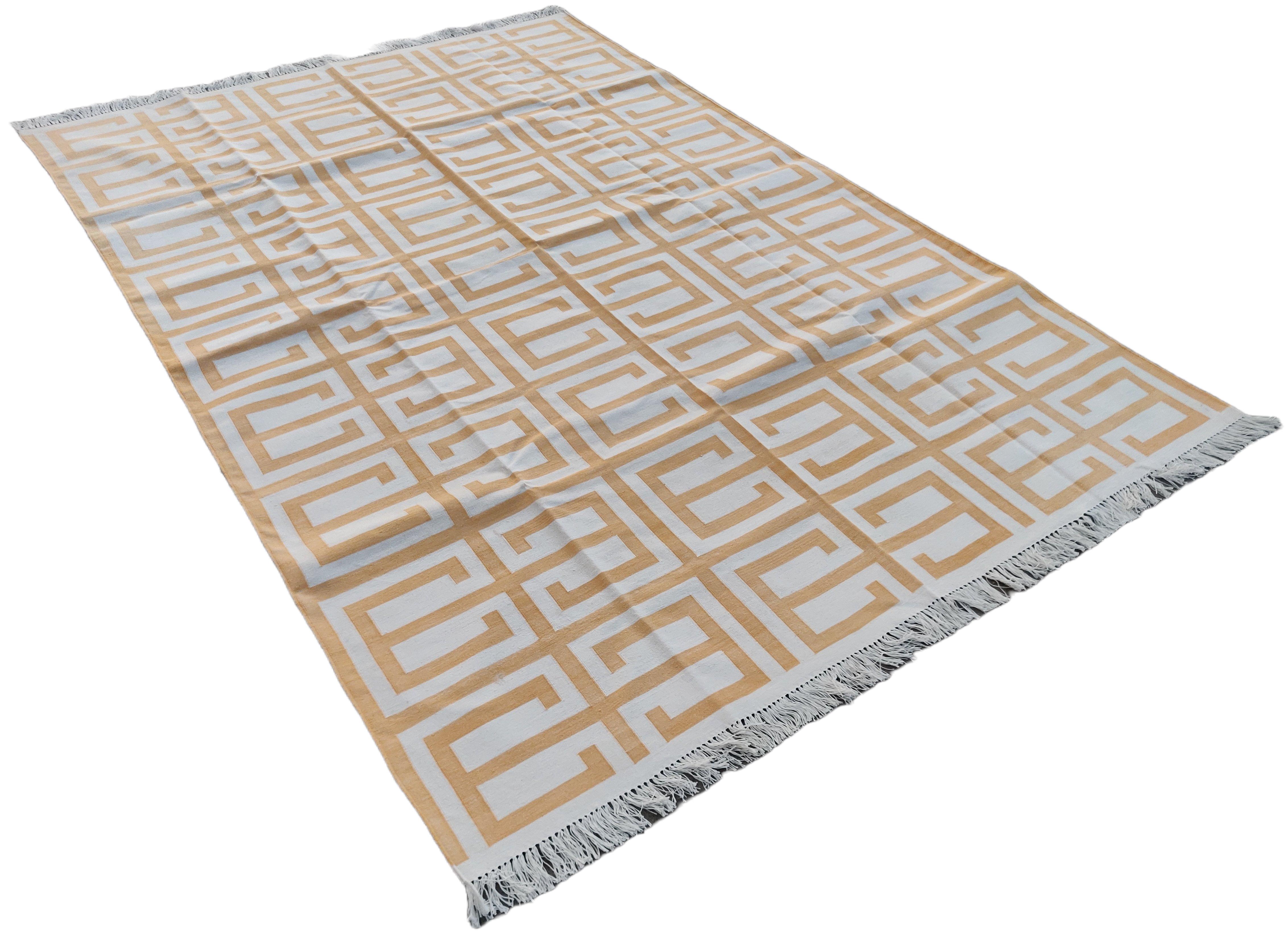 Cotton Vegetable Dyed Yellow And Cream Geometric Indian Dhurrie Rug-6'x9' 
These special flat-weave dhurries are hand-woven with 15 ply 100% cotton yarn. Due to the special manufacturing techniques used to create our rugs, the size and color of each