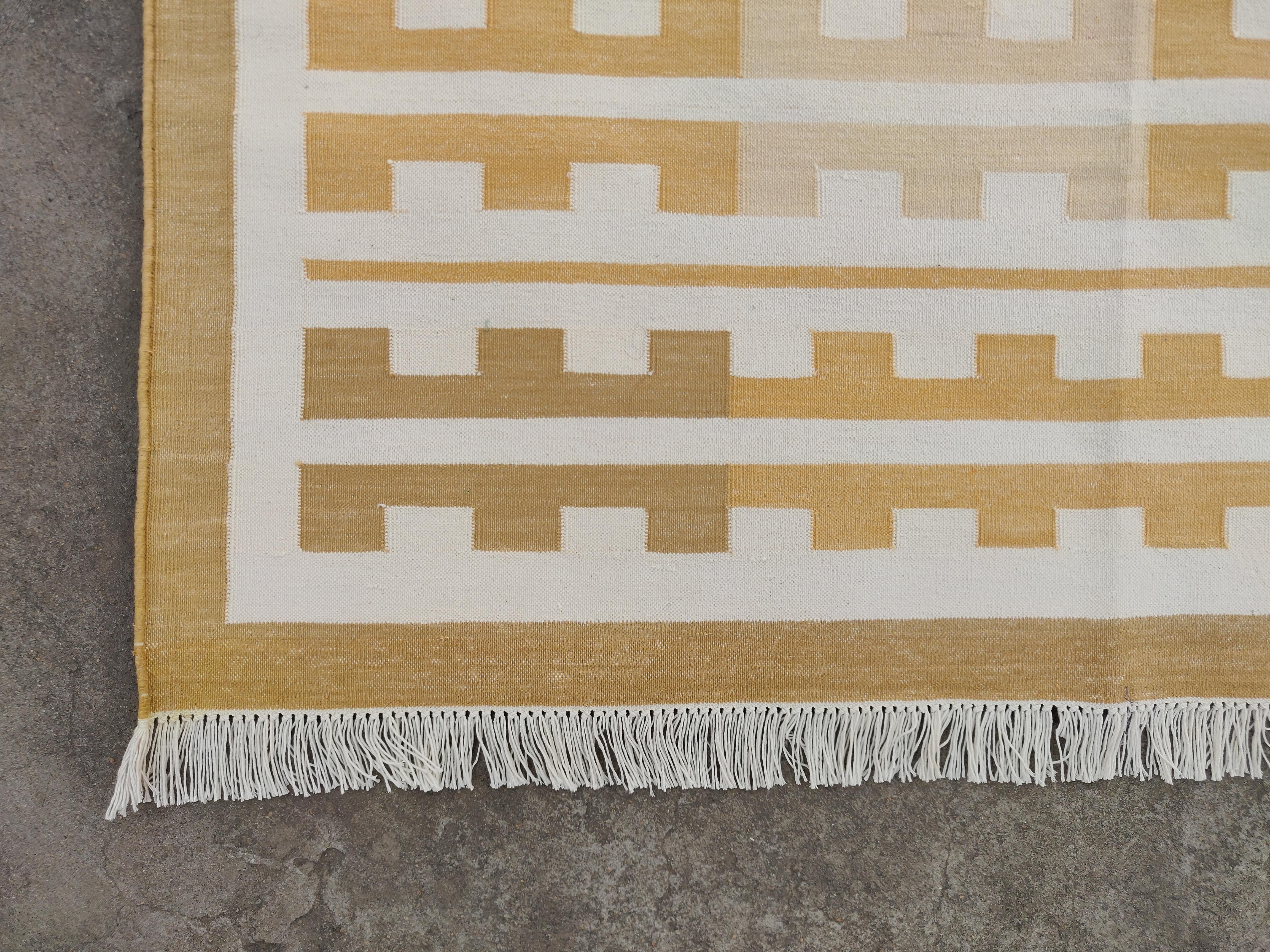 Contemporary Handmade Cotton Area Flat Weave Rug, 6x9 Yellow, White Marianne Striped Dhurrie For Sale