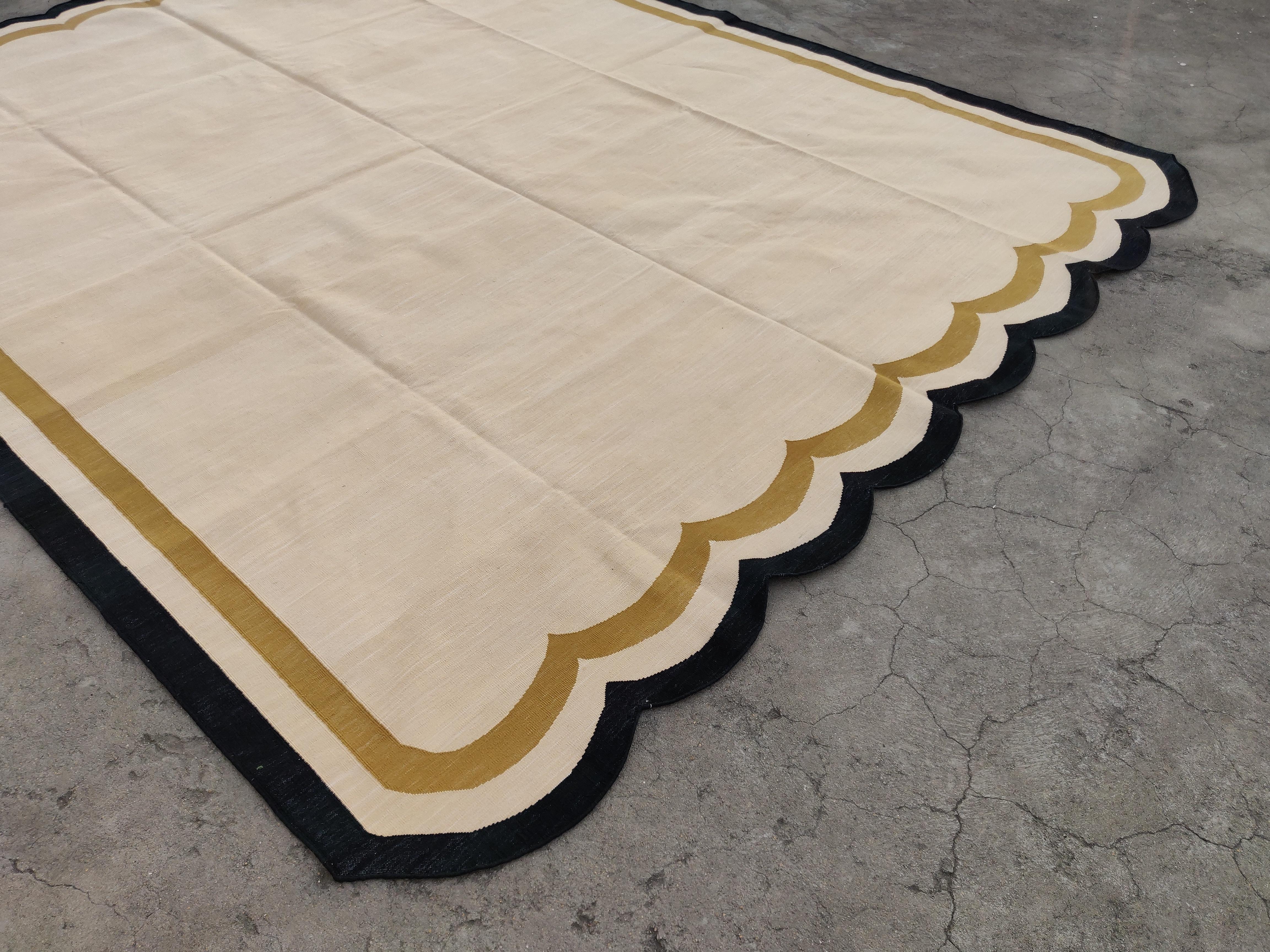 Cotton Vegetable Dyed Beige And Black Scalloped Striped Indian Dhurrie Rug-8'x10' 
These special flat-weave dhurries are hand-woven with 15 ply 100% cotton yarn. Due to the special manufacturing techniques used to create our rugs, the size and color