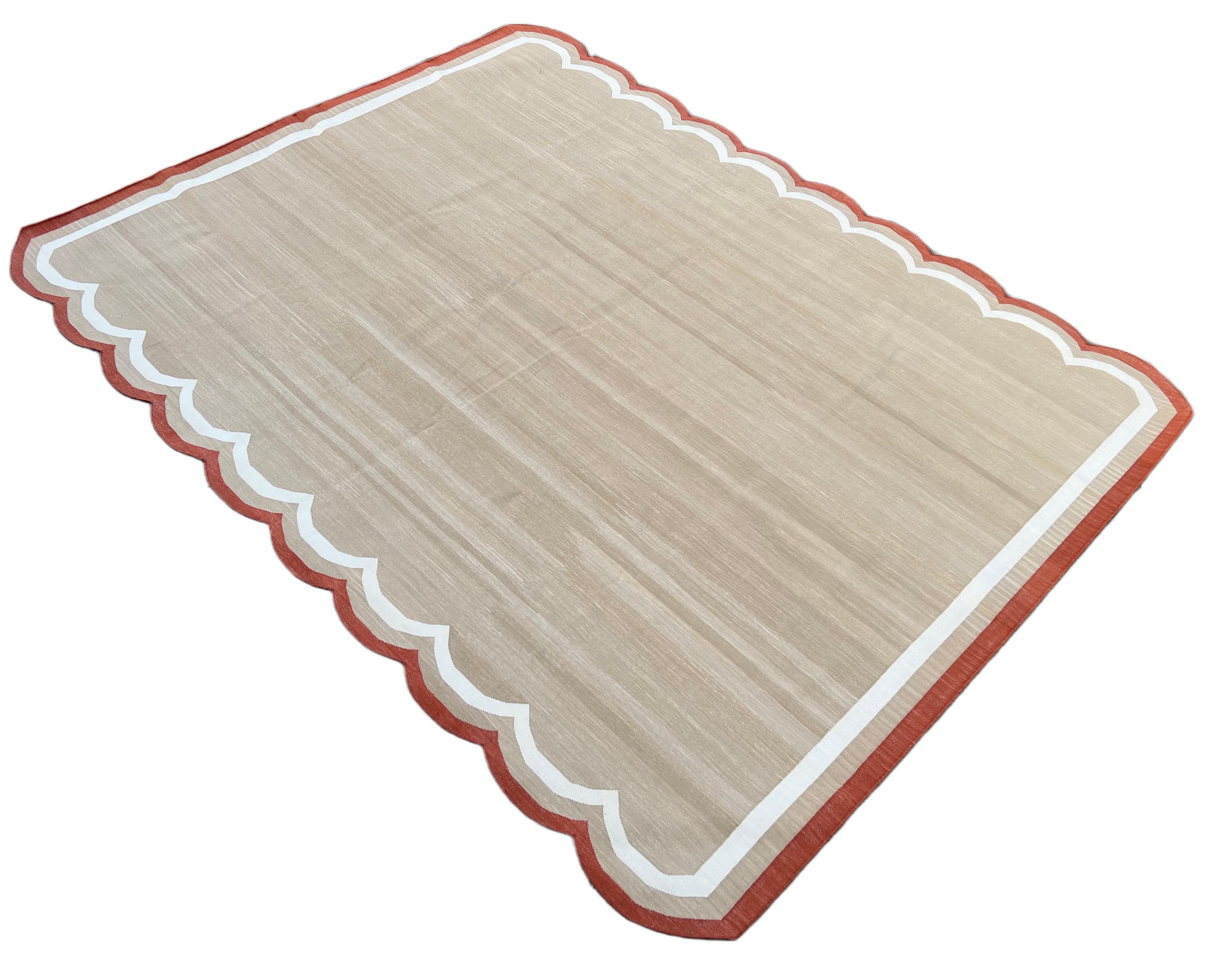 Cotton Vegetable Dyed Beige, Cream And Terracotta Red Two Sided Scalloped Rug-8'x10' 
(Scallops runs on all 10 Feet Sides)
These special flat-weave dhurries are hand-woven with 15 ply 100% cotton yarn. Due to the special manufacturing techniques