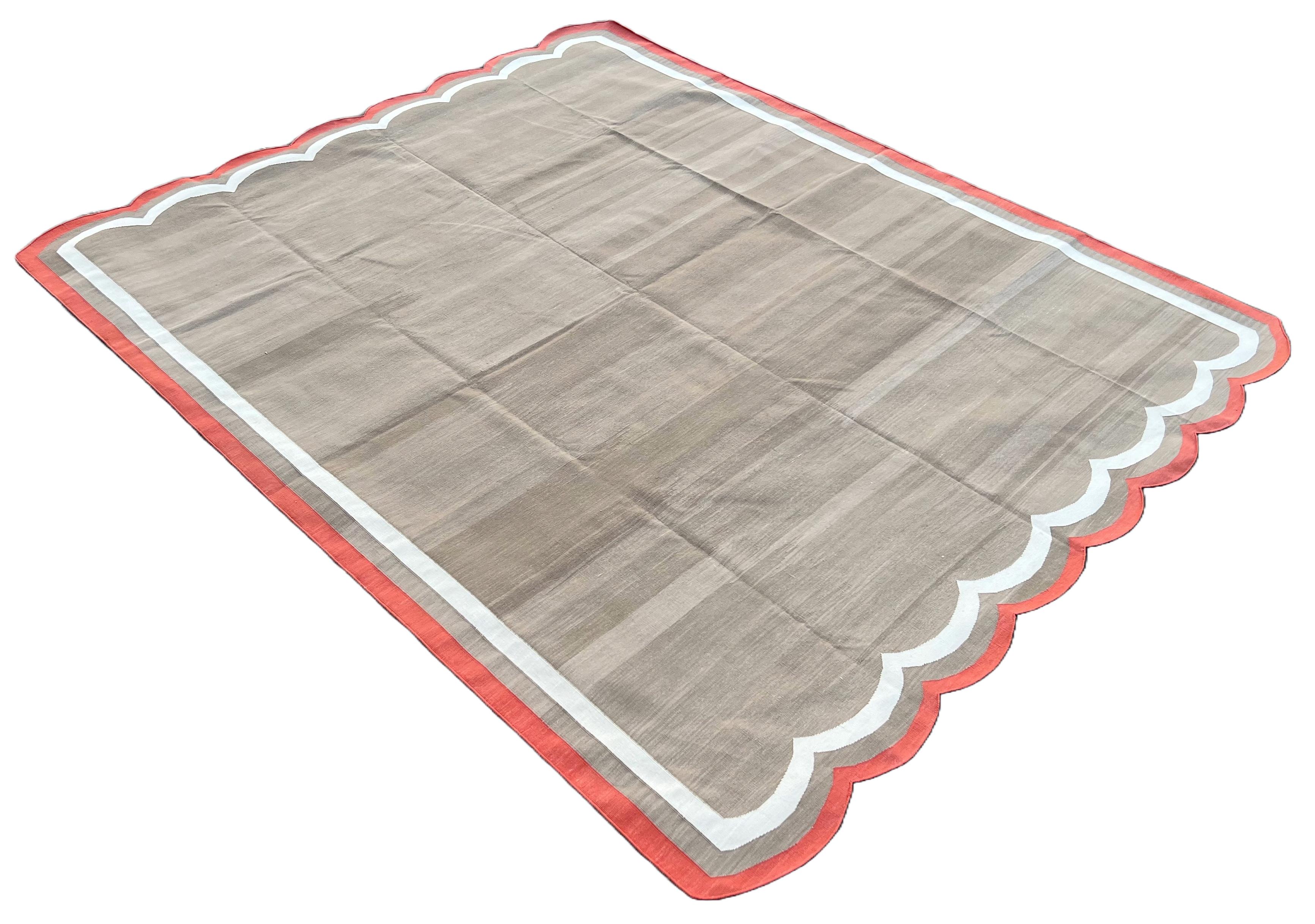 Cotton Vegetable Dyed Beige, Cream And Coral Two Sided Scalloped Rug-8'x10' 
(Scallops runs on all 8 Feet Sides)
These special flat-weave dhurries are hand-woven with 15 ply 100% cotton yarn. Due to the special manufacturing techniques used to