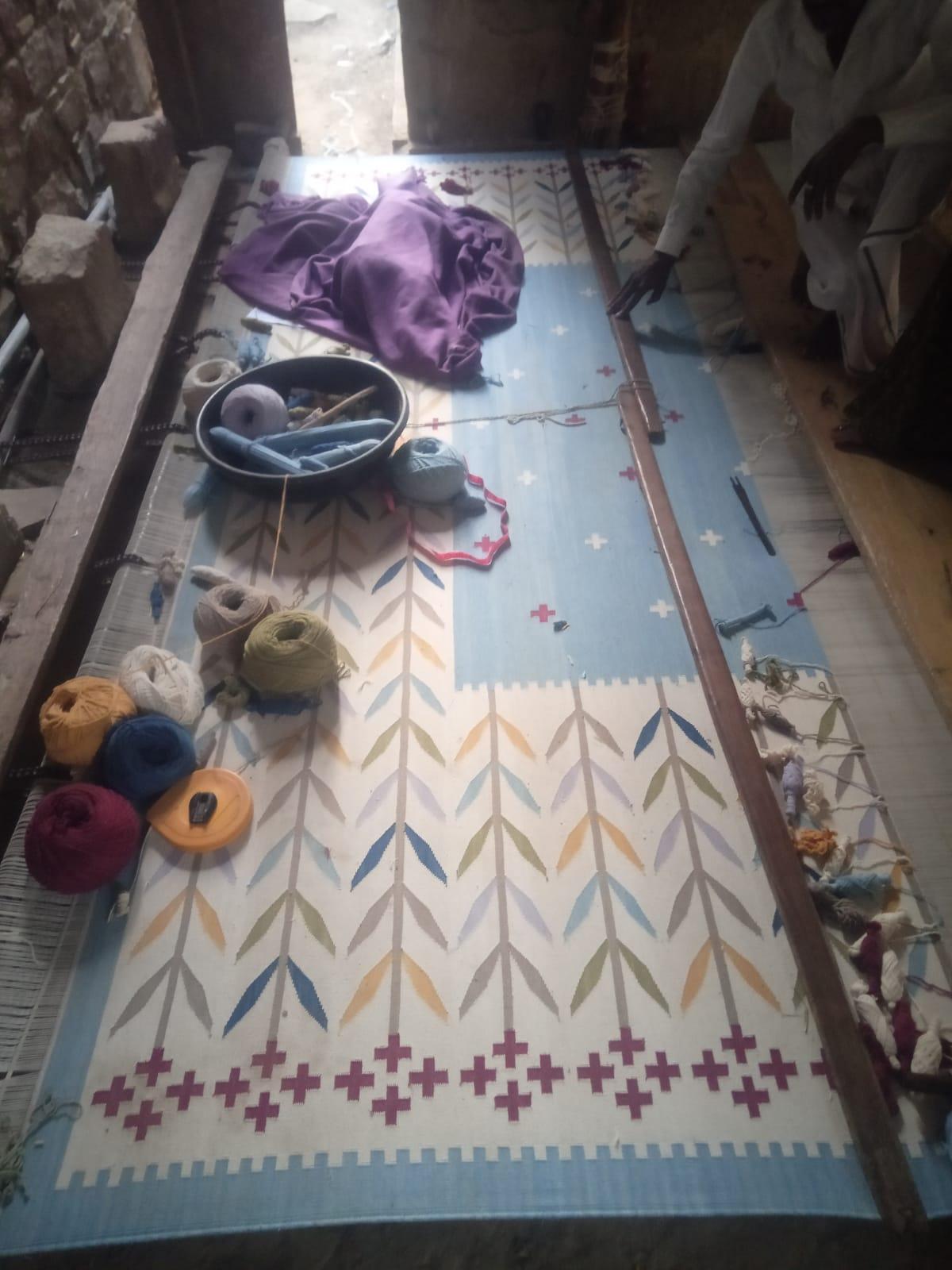 Cotton Vegetable Dyed Cream, Blue, Yellow And Beige Leaf Patterned Indian Rug Dhurrie - 8'x10' (240x300cm)

These special flat-weave dhurries are hand-woven with 15 ply 100% cotton yarn. Due to the special manufacturing techniques used to create our