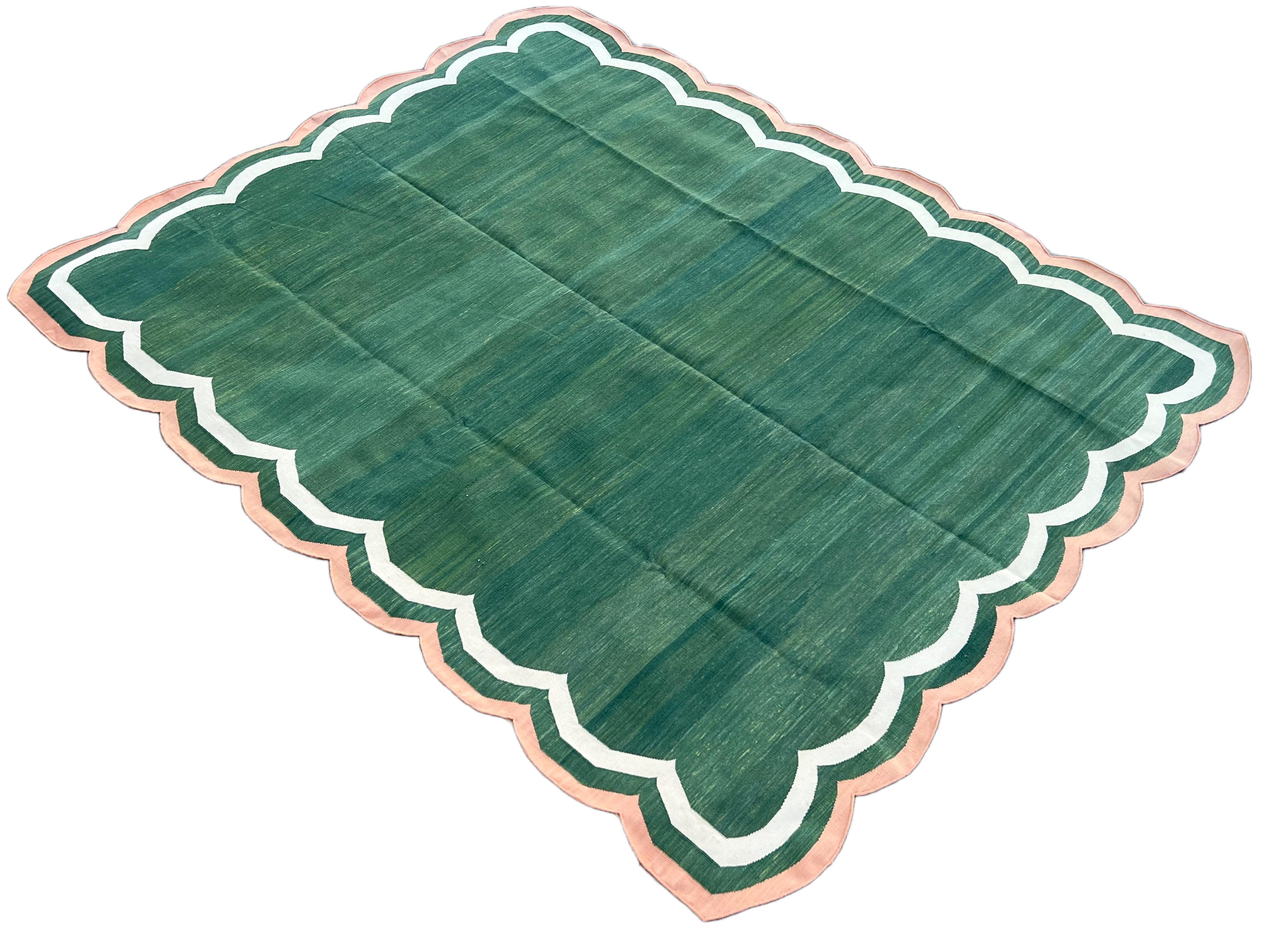 Cotton Vegetable Dyed Green and Coral 4 Sided Indian Scalloped Rug - 8'x10'
These special flat-weave dhurries are hand-woven with 15 ply 100% cotton yarn. Due to the special manufacturing techniques used to create our rugs, the size and color of