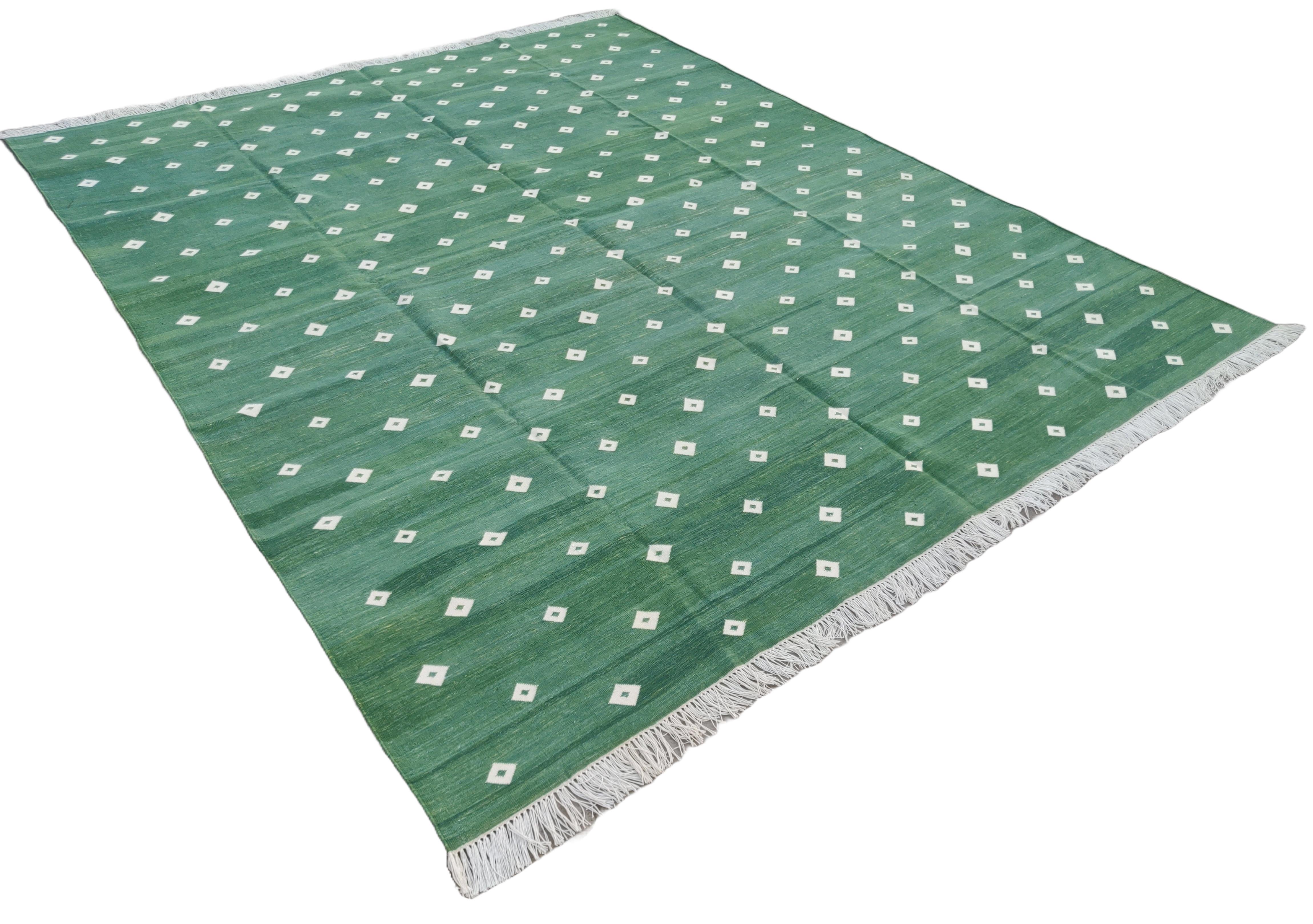 Handmade Cotton Natural Vegetable Dyed Rug, Forest Green And White Diamond Indian Dhurrie- 8'x10'
These special flat-weave dhurries are hand-woven with 15 ply 100% cotton yarn. Due to the special manufacturing techniques used to create our rugs, the