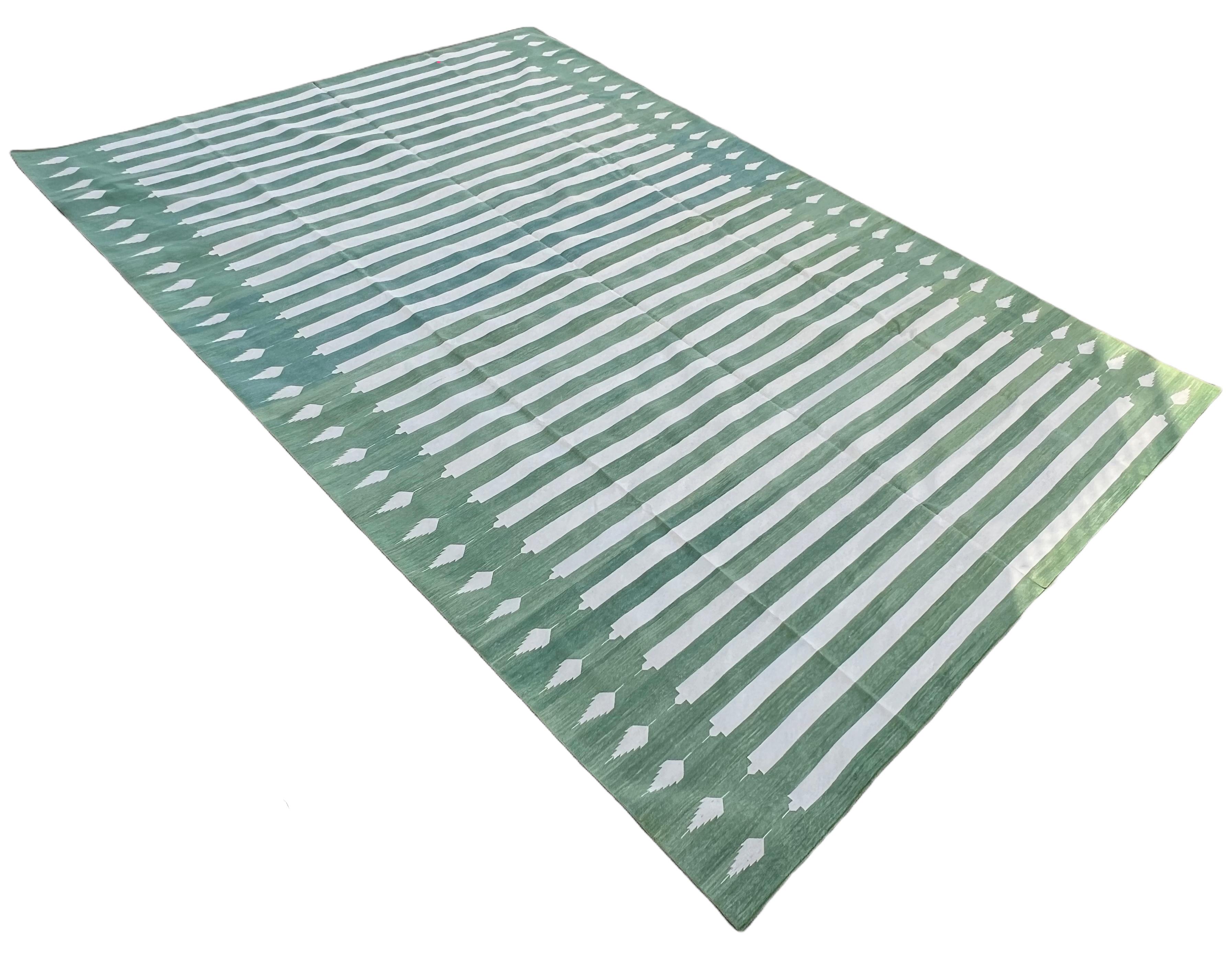 Cotton Natural Vegetable Dyed Moss Green And White Arrow Striped Indian Rug-9'x12'

These special flat-weave dhurries are hand-woven with 15 ply 100% cotton yarn. Due to the special manufacturing techniques used to create our rugs, the size and