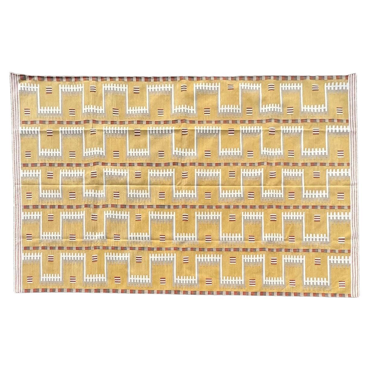 Cotton Natural Vegetable Dyed, Mustard, Cream And Beige Geometric Indian Dhurrie-9'x12'
These special flat-weave dhurries are hand-woven with 15 ply 100% cotton yarn. Due to the special manufacturing techniques used to create our rugs, the size and
