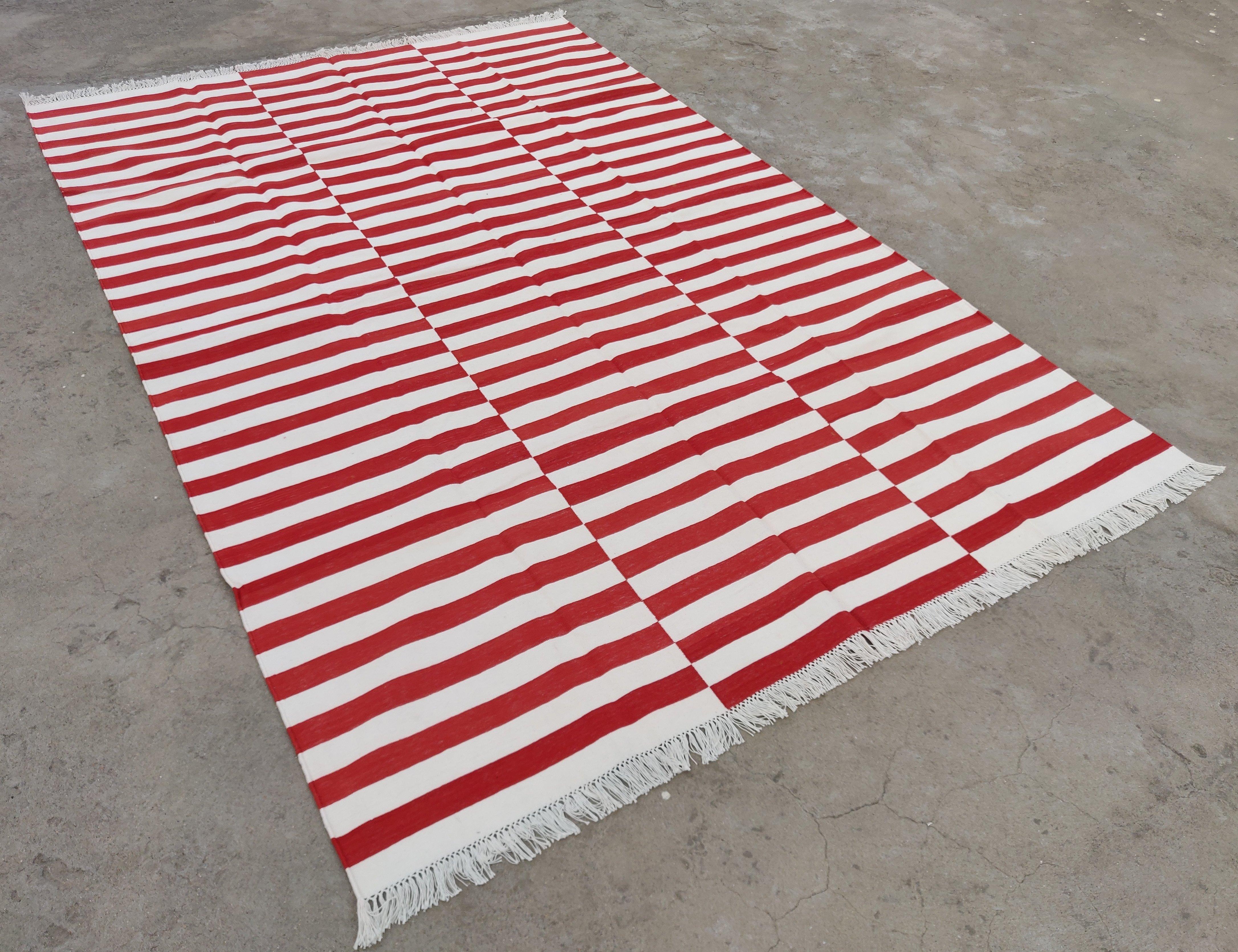 Cotton Vegetable Dyed Red And White Up Down Striped Indian Dhurrie Rug-9'x12' 

These special flat-weave dhurries are hand-woven with 15 ply 100% cotton yarn. Due to the special manufacturing techniques used to create our rugs, the size and color of