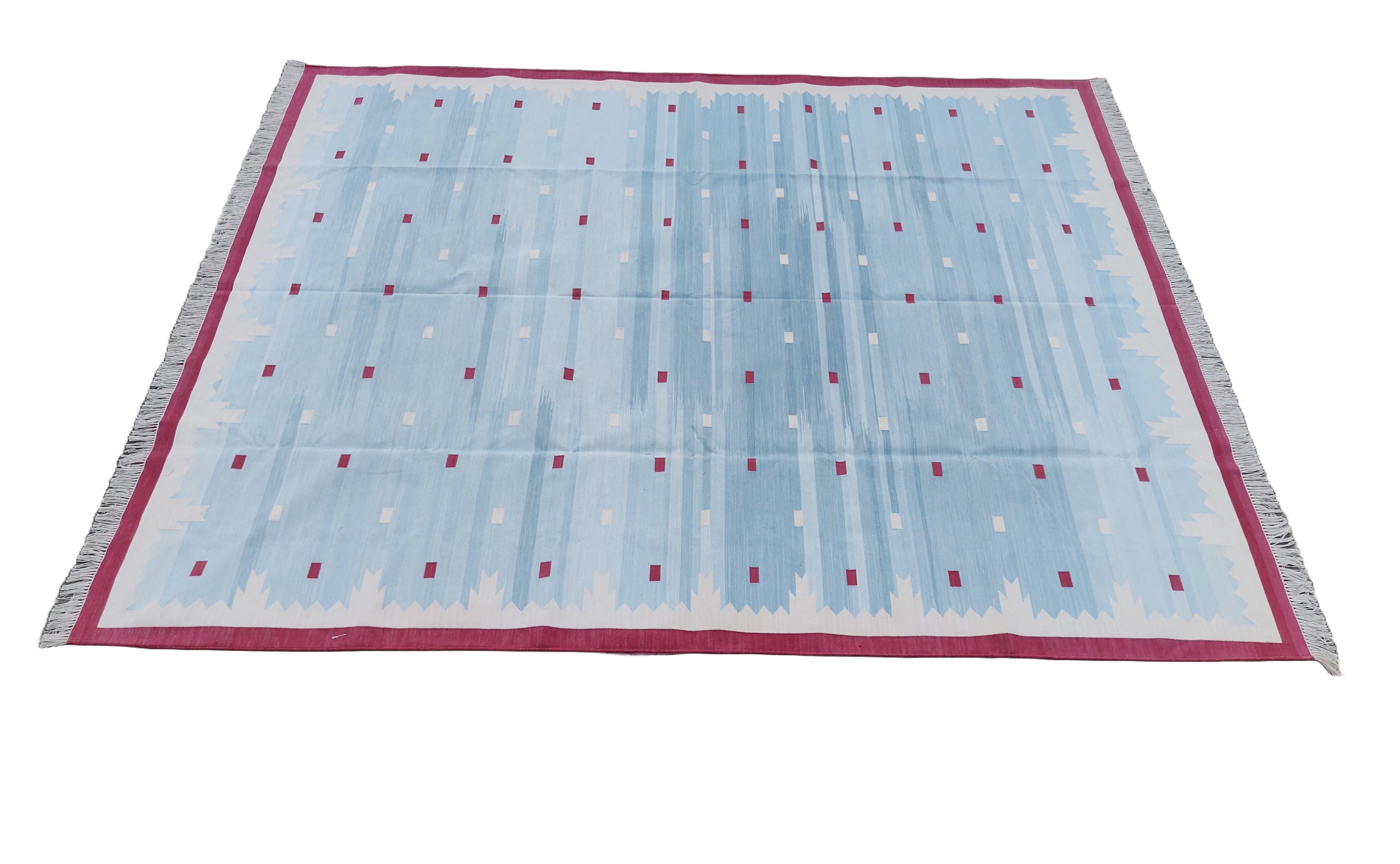 Cotton Vegetable Dyed Reversible Sky Blue And Pink Geometric Patterned Indian Rug - 8'x10'
These special flat-weave dhurries are hand-woven with 15 ply 100% cotton yarn. Due to the special manufacturing techniques used to create our rugs, the size