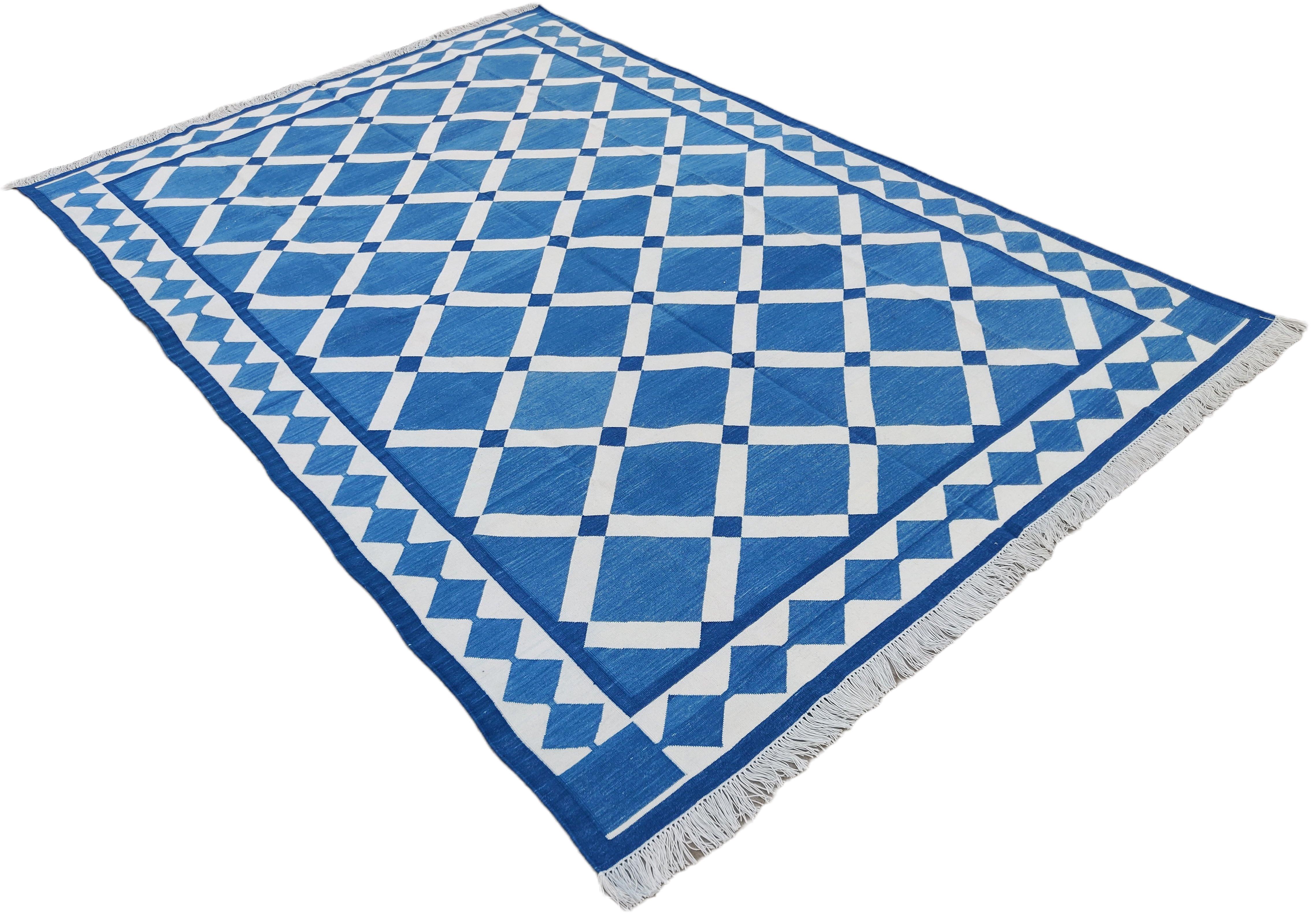 Cotton Vegetable Dyed Reversible Blue And White Geometric Patterned Indian Rug - 8'x10'
These special flat-weave dhurries are hand-woven with 15 ply 100% cotton yarn. Due to the special manufacturing techniques used to create our rugs, the size and