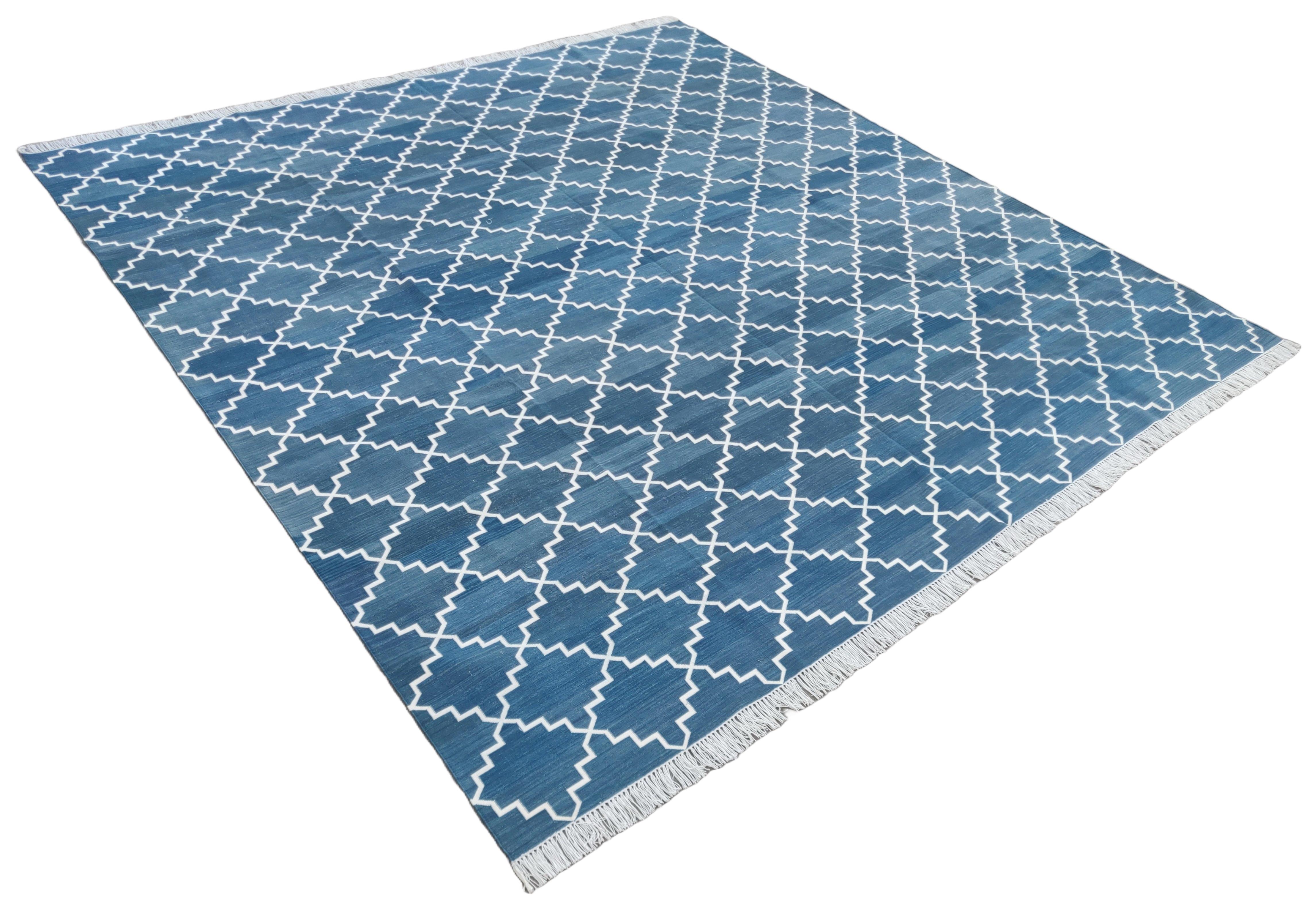 Cotton Vegetable Dyed Reversible Blue And White Geometric Universal Pattern Indian Rug - 8'x10'
These special flat-weave dhurries are hand-woven with 15 ply 100% cotton yarn. Due to the special manufacturing techniques used to create our rugs, the