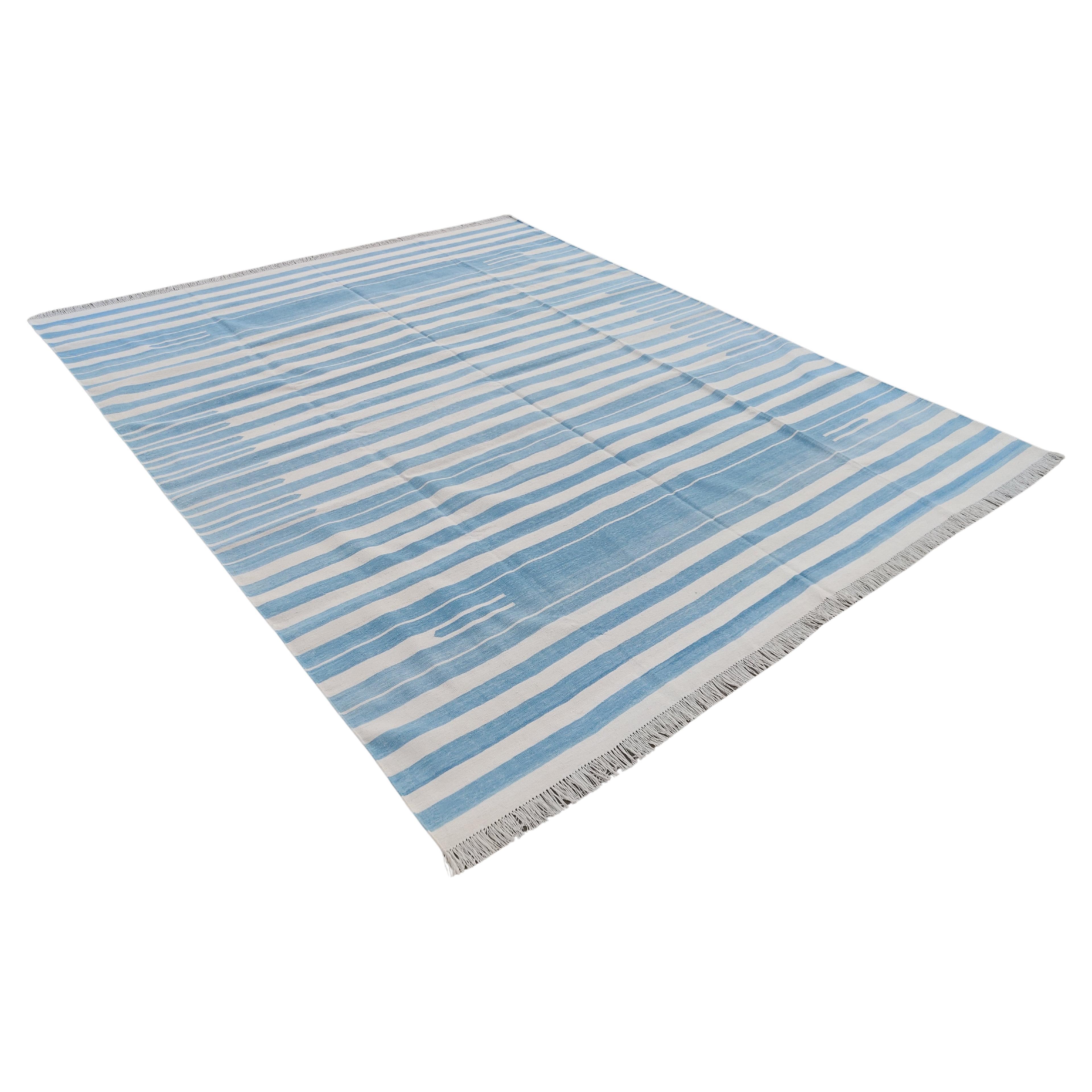 Cotton Natural Vegetable Dyed Sky Blue And White Striped Rug-6'x9'
These special flat-weave dhurries are hand-woven with 15 ply 100% cotton yarn. Due to the special manufacturing techniques used to create our rugs, the size and color of each piece