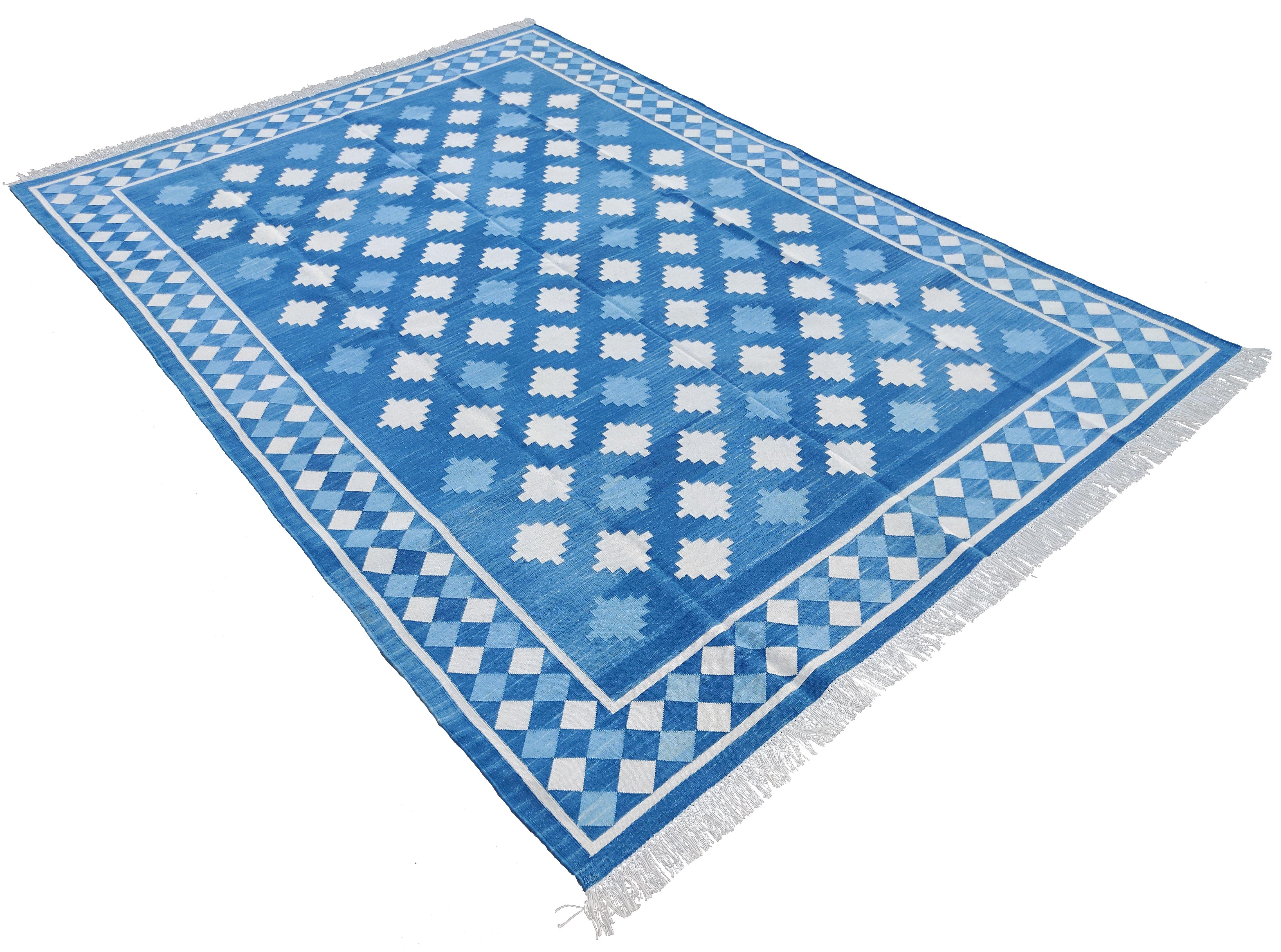 Cotton Natural Vegetable Dyed Cream, Blue And Cream Geometric Star Indian Rug-6'x9'
These special flat-weave dhurries are hand-woven with 15 ply 100% cotton yarn. Due to the special manufacturing techniques used to create our rugs, the size and