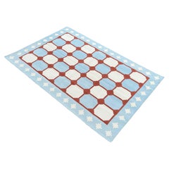 Tappeto a tessitura piatta in cotone fatto a mano, blu e rosso, stella geometrica indiana Dhurrie