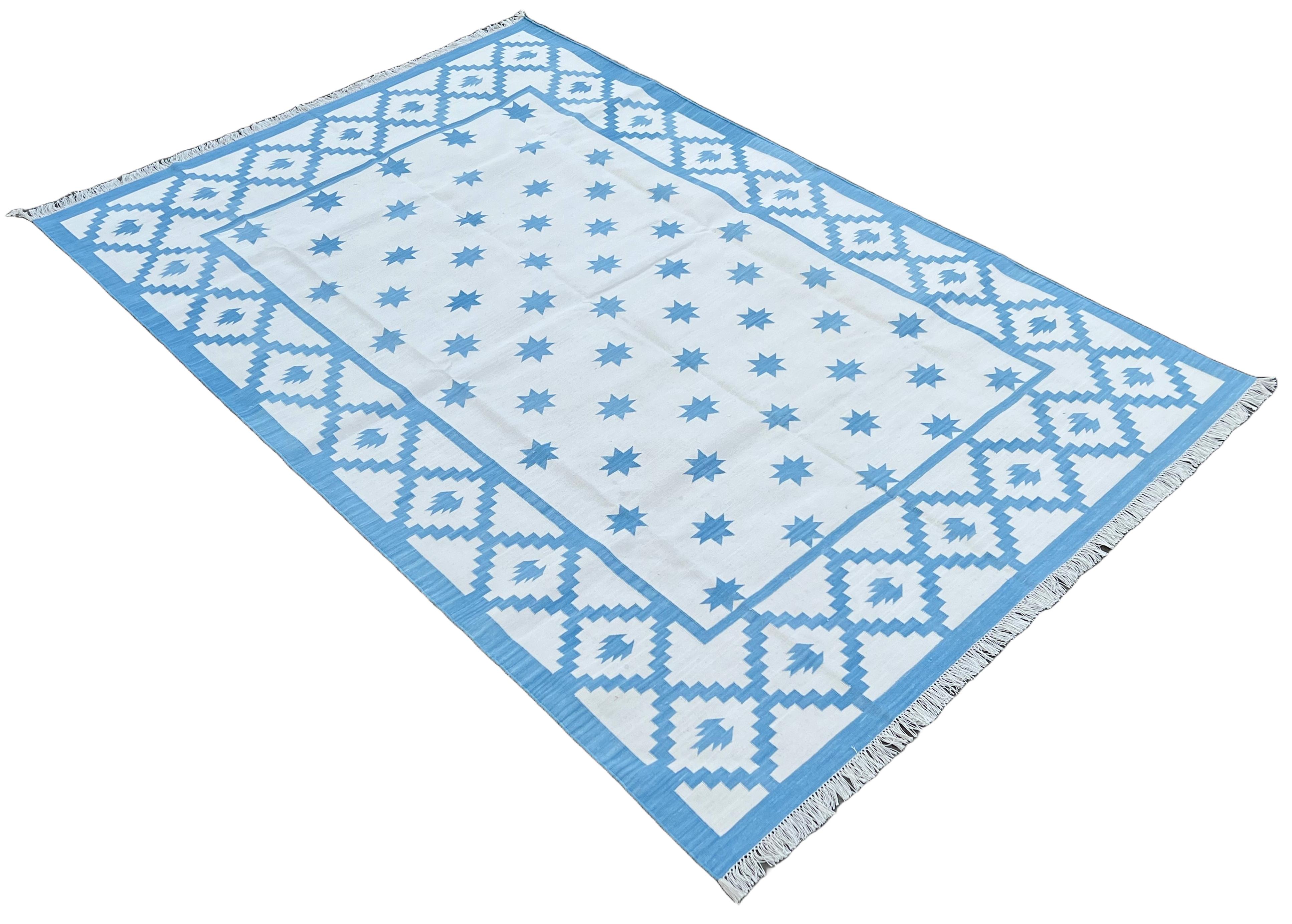 Cotton Vegetable Dyed Reversible Sky Blue And White Indian Star Geometric Rug - 6'x9'
These special flat-weave dhurries are hand-woven with 15 ply 100% cotton yarn. Due to the special manufacturing techniques used to create our rugs, the size and
