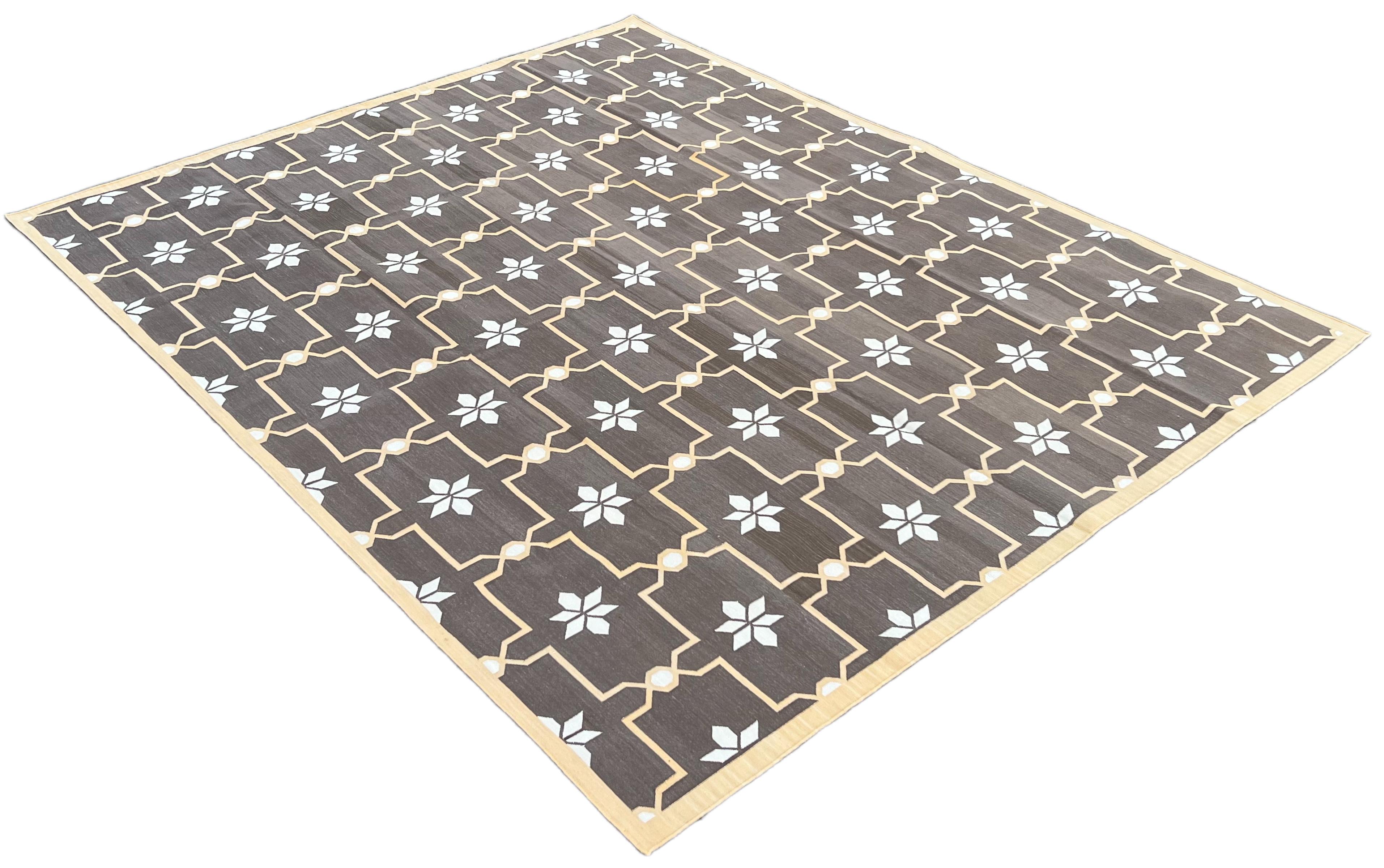 Cotton Natural Vegetable Dyed Coffee Brown And Cream Flower Pattern Indian Rug-8'x10'
These special flat-weave dhurries are hand-woven with 15 ply 100% cotton yarn. Due to the special manufacturing techniques used to create our rugs, the size and