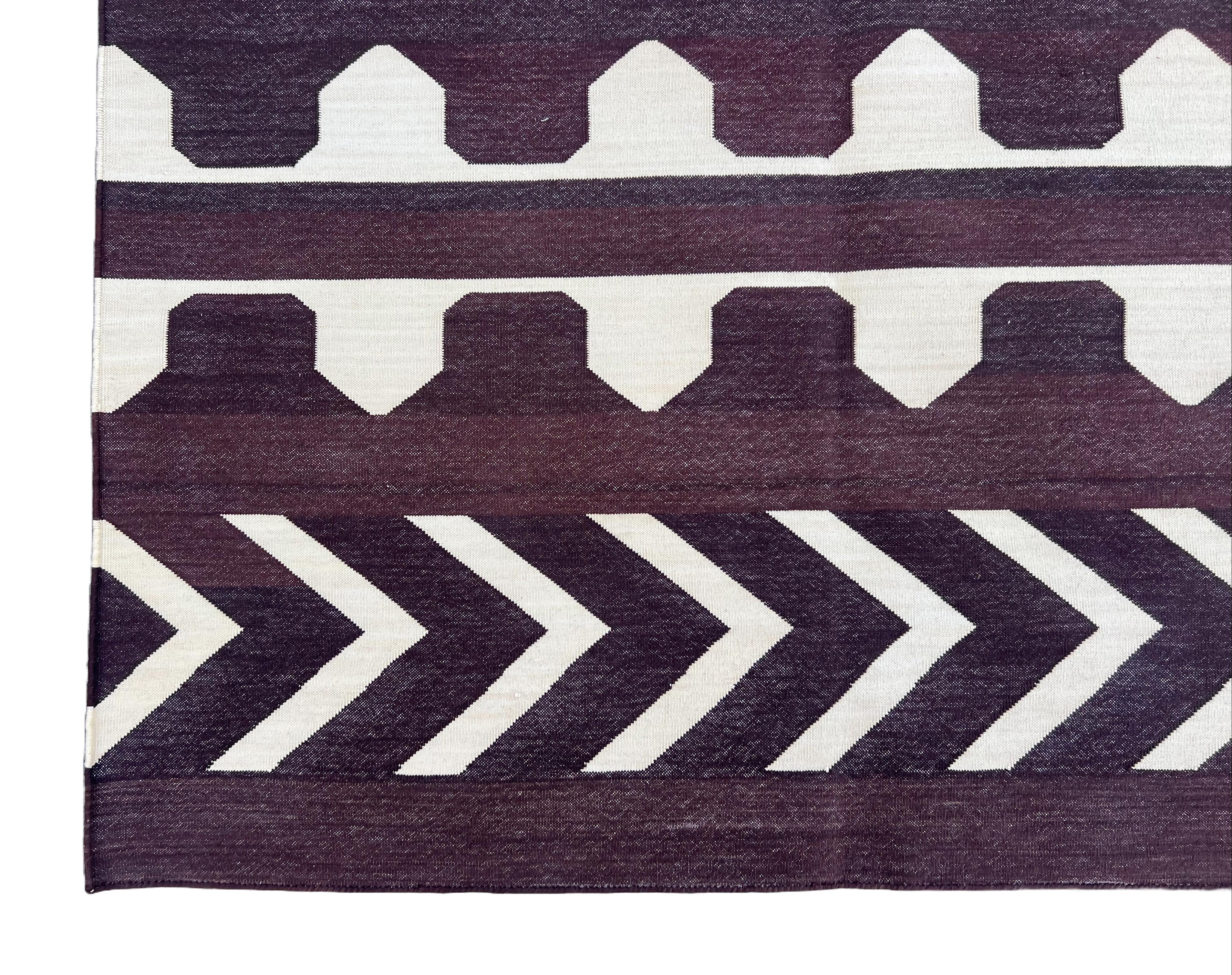 Cotton Vegetable Dyed Reversible Coffee Brown And Cream Geometric Indian Rug - 8'x10'
These special flat-weave dhurries are hand-woven with 15 ply 100% cotton yarn. Due to the special manufacturing techniques used to create our rugs, the size and