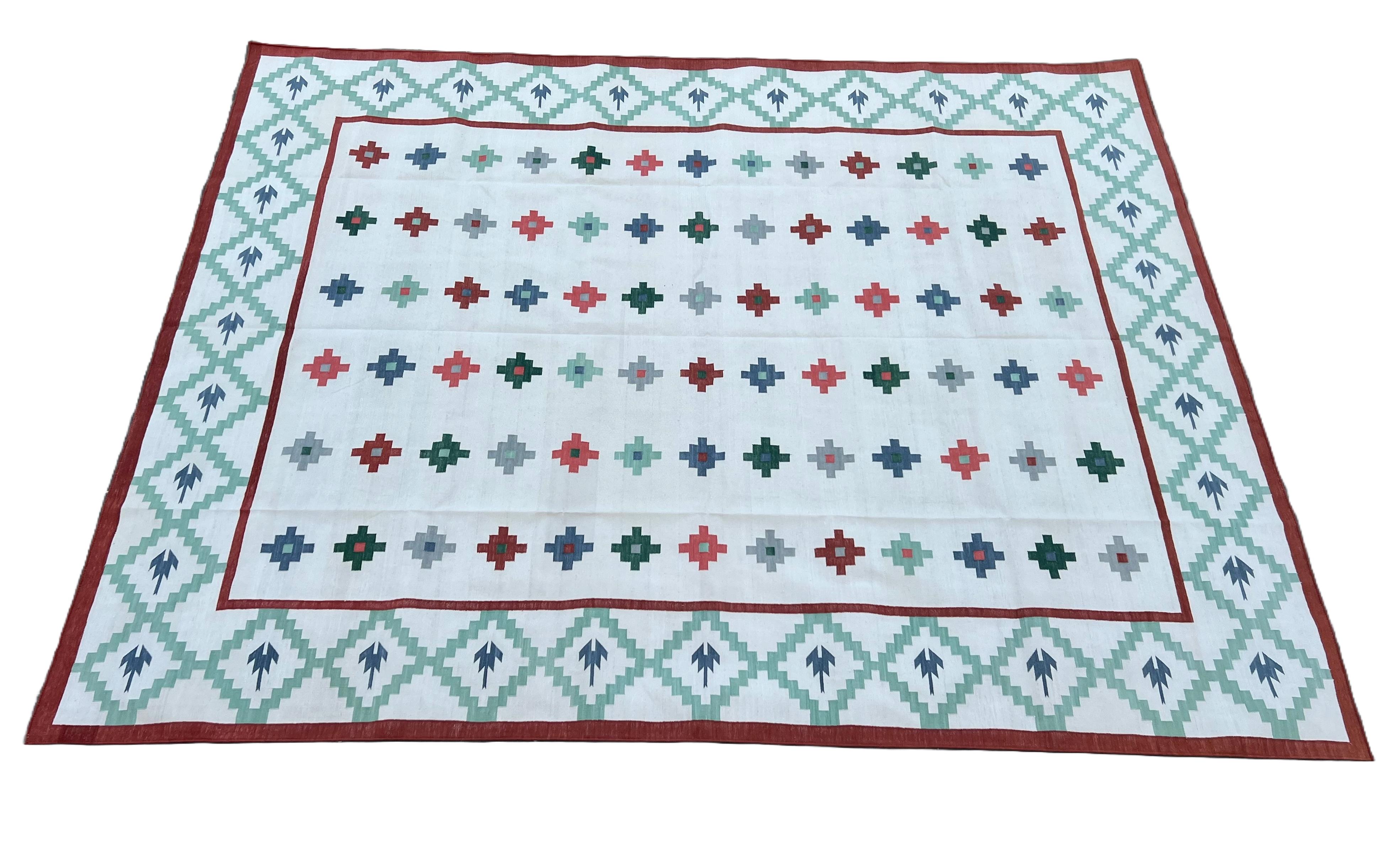 Cotton Vegetable Dyed Reversible Cream And Green Indian Star Geometric Rug - 6'x9'
These special flat-weave dhurries are hand-woven with 15 ply 100% cotton yarn. Due to the special manufacturing techniques used to create our rugs, the size and color