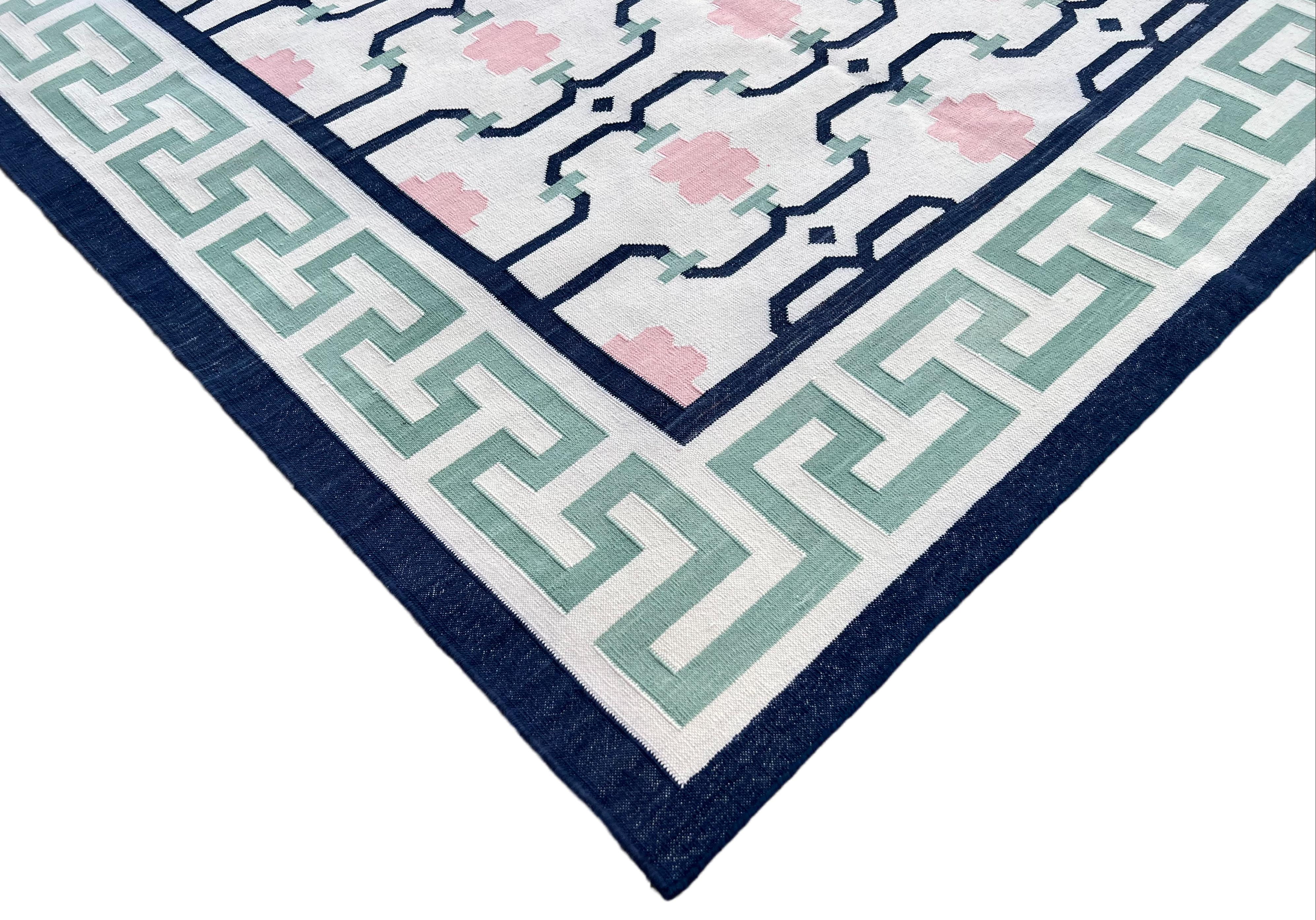 Cotton Natural Vegetable Dyed Cream, Green, Pink & Navy Blue Geometric Indian Rug-9'x12'
These special flat-weave dhurries are hand-woven with 15 ply 100% cotton yarn. Due to the special manufacturing techniques used to create our rugs, the size and