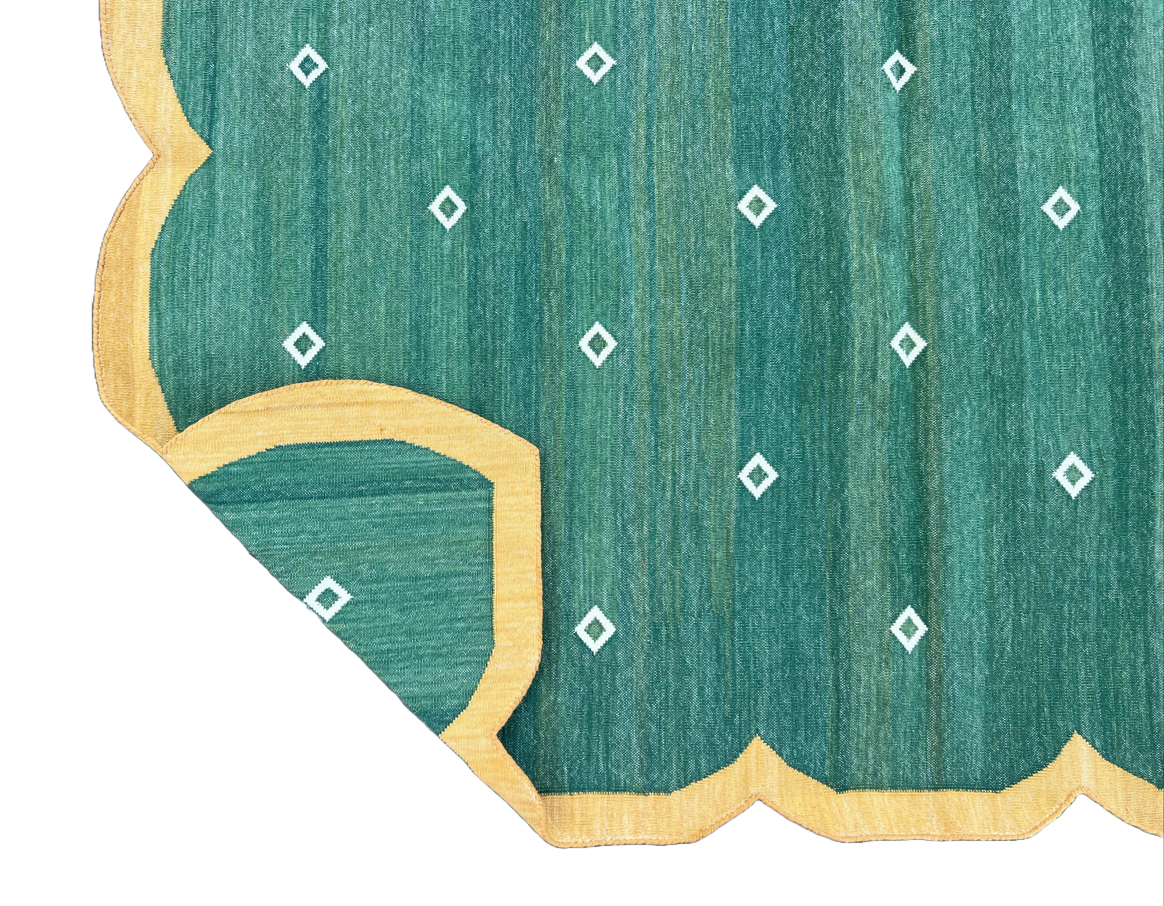 Cotton Vegetable Dyed Reversible Forest Green, Cream And Yellow Border Scalloped Indian Rug - 5'x8'
These special flat-weave dhurries are hand-woven with 15 ply 100% cotton yarn. Due to the special manufacturing techniques used to create our rugs,