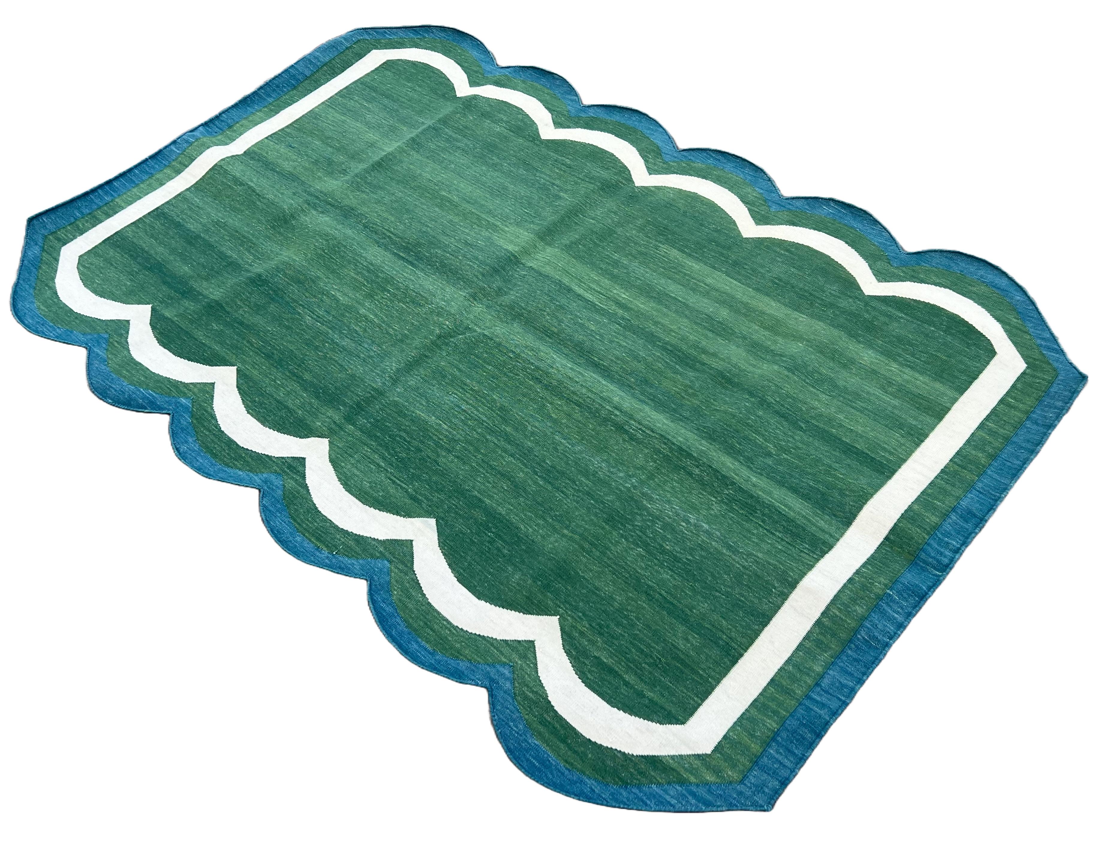 Cotton Vegetable Dyed Forest Green & Teal Blue Two Sided Scalloped Rug-4'x6' (Scallops runs on all 6' Sides)
These special flat-weave dhurries are hand-woven with 15 ply 100% cotton yarn. Due to the special manufacturing techniques used to create