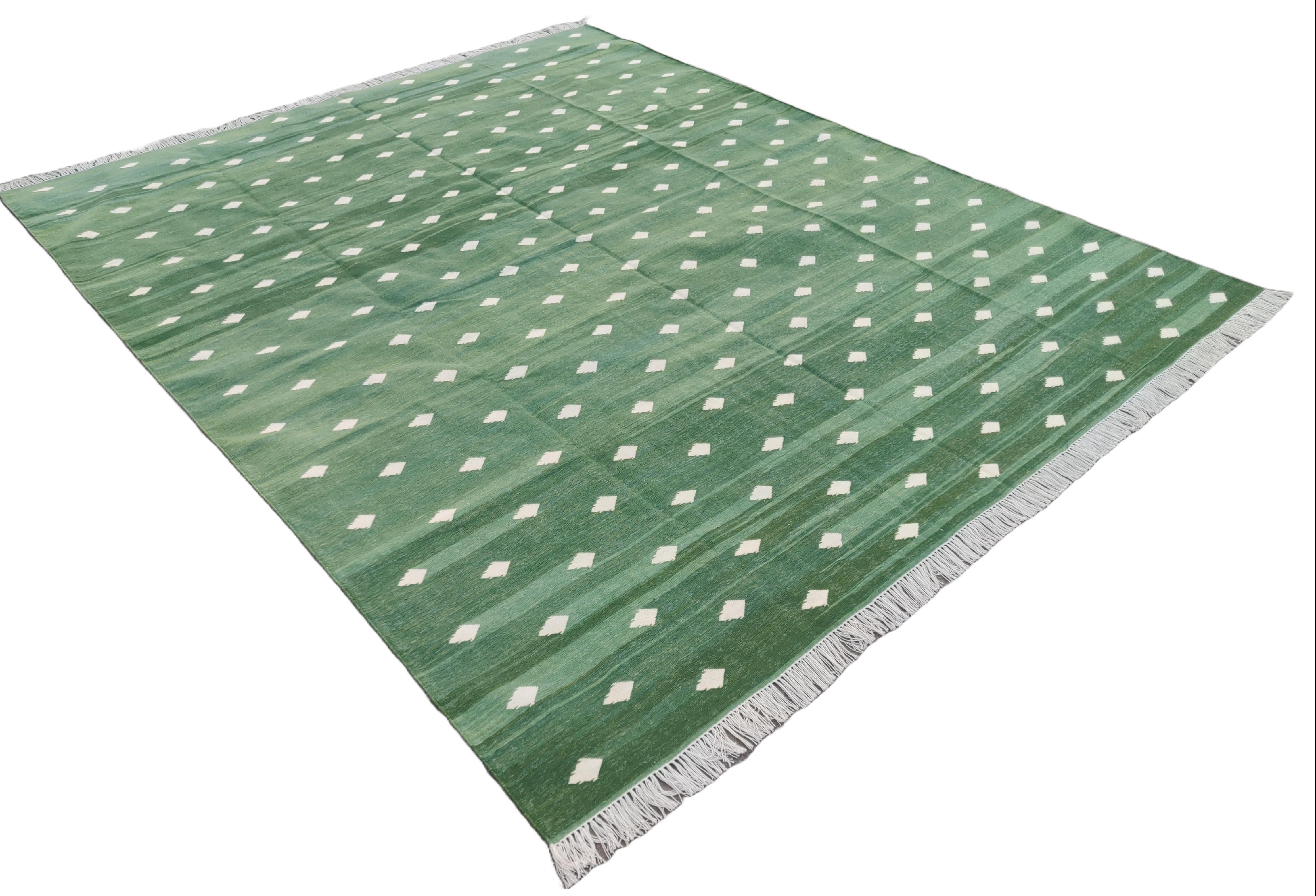 Cotton Natural Vegetable Dyed, Forest Green & White Leaf Patterned Rug-8'x10'
These special flat-weave dhurries are hand-woven with 15 ply 100% cotton yarn. Due to the special manufacturing techniques used to create our rugs, the size and color of